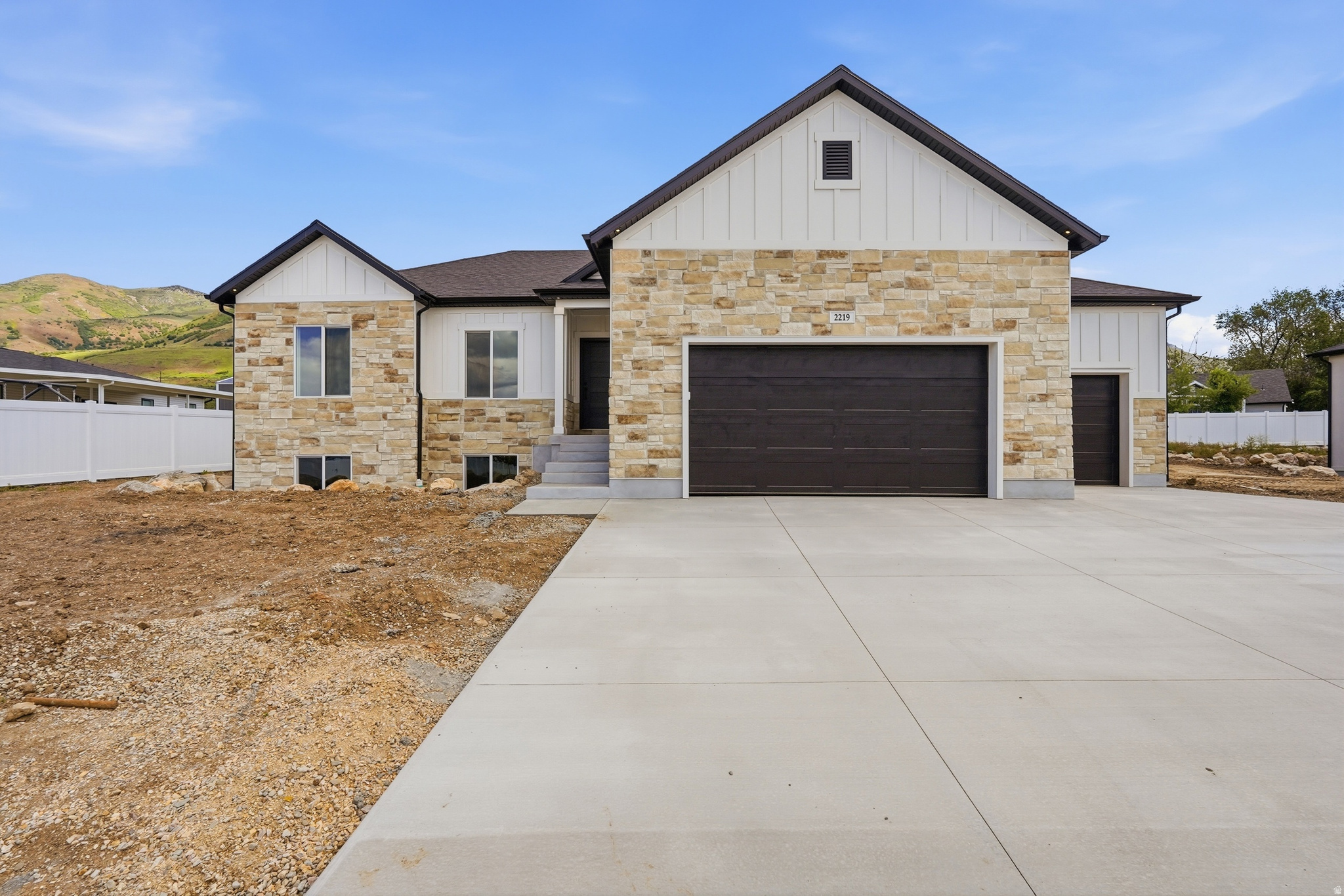 Located on the beautiful east bench of Perry with stunning mountain and valley views, this modern transitional rambler offers exceptional craftsmanship and today's most sought-after finishes. Built by a builder known for high-end quality, this home features 3,200 total square feet with 1,600 square feet on the main level and an unfinished walk-out basement ready for future expansion, all situated on a spacious -acre lot. The exterior showcases a beautiful blend of stone, Hardie siding, and stucco, while the interior features vaulted ceilings, custom hardwood flooring, designer tile, accent walls, and upscale lighting throughout. The gourmet kitchen includes Bosch appliances, a cooktop with custom hood, a large island, Level 6 quartz countertops with thick mitered edges, and a spacious pantry with custom shelving. The luxurious primary suite offers alder ceiling beams, a large custom closet, soaker tub, and a custom shower with Euro glass door. Additional highlights include a 3-car insulated garage with upgraded MyQ wireless garage doors, covered patio, iron stair railing, 5-foot linear fireplace, tankless water heater with recirculator, 96% efficiency furnace, and 30-year shingles. Seller is offering a $10,000 incentive toward buyer closing costs, subject to lender requirements.