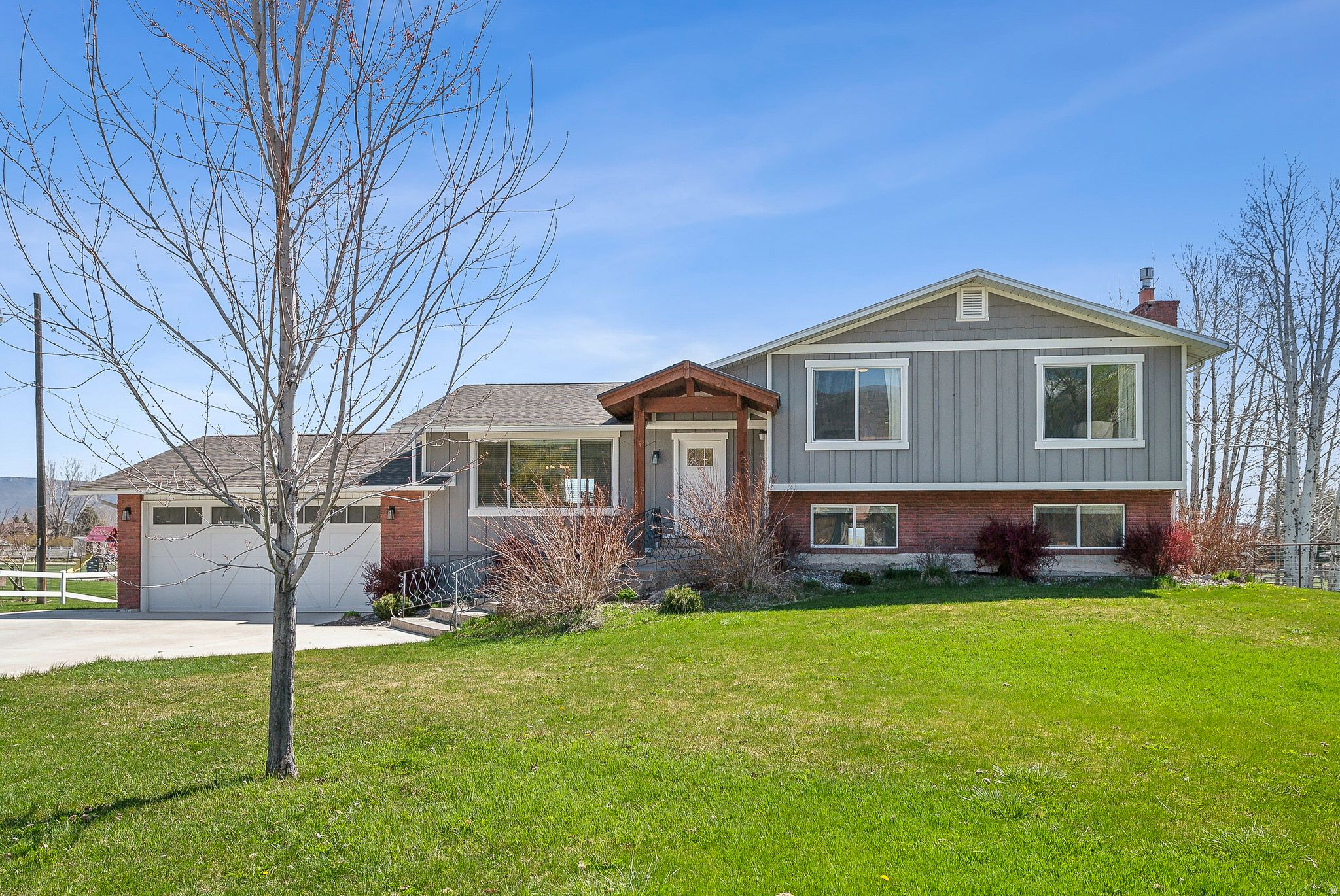 1.37 acre lot adjoining this property also for sale - MLS #2167400. Ask for details! The best of Midway living - without compromise. Nestled on nearly a half-acre lot along a quiet country lane, this beautifully updated home sits right in the heart of one of Utah's most beloved small towns - and it's priced to make the dream attainable. Inside, the bright and modern kitchen is a true showstopper, framing sweeping views of the open green space beyond the property - a rare combination of beauty, privacy, and wide-open breathing room that's hard to find anywhere, let alone in the center of town. Step outside and you're surrounded by the timeless charm that makes Midway so special - stunning mountain backdrops, tree-lined streets, and a warm, welcoming neighborhood feel. Main Street, local shops, and the beloved town square are all just a short stroll away, making this the kind of home where convenience and tranquility coexist beautifully. Whether you're looking to put down roots or escape the pace of city life, this is the lifestyle you've been looking for - and with an adjoining 1.37-acre lot also available, the possibilities are wide open. Buyer to verify all information.  Square footage figures are provided as a courtesy estimate only.  Buyer is advised to obtain an independent measurement.