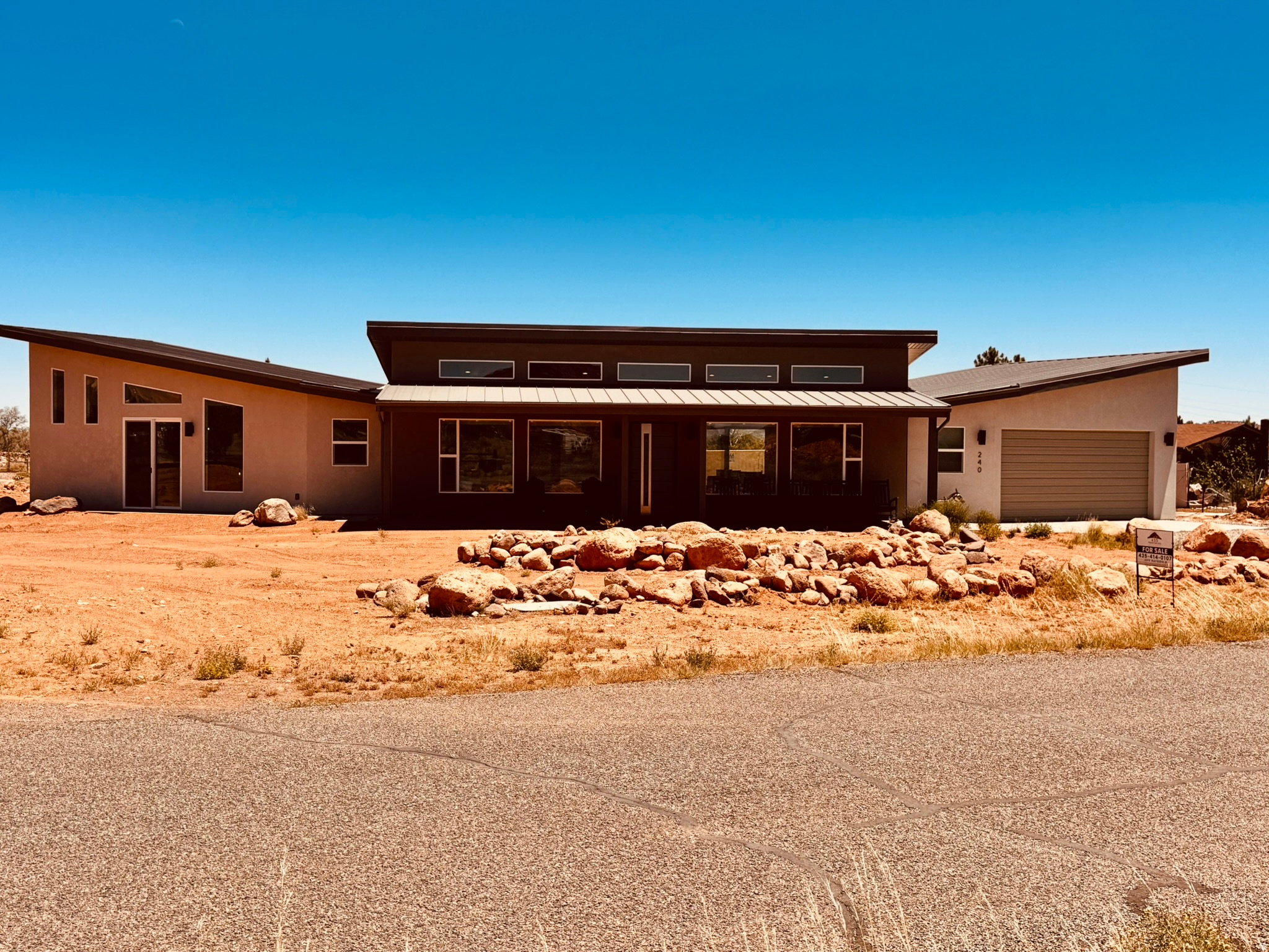 Built in 2024 by Richardson Brothers Custom Homes of St. George , this beautifully crafted 3-bedroom, 2-bath home offers incredible mountain views just minutes from Torrey and Capitol Reef National Park. Designed as a turnkey vacation home, most furnishings and household items are included. The home has been used only lightly as a vacation property since it was built and remains in excellent condition.  No corners were cut in construction, with quality finishes and thoughtful upgrades throughout, including an on-demand water heater, RV parking with 50-amp service plus sewer and water hookups, and a garage equipped with two 50-amp EV charging circuits. There may also be potential for overnight rental income, subject to buyer verification with Torrey Town.  A rare opportunity to own a move-in ready home in one of Southern Utah's most scenic destinations. Square footage figures are provided as a courtesy estimate only and were obtained from seller.  Buyer is advised to obtain an independent measurement.