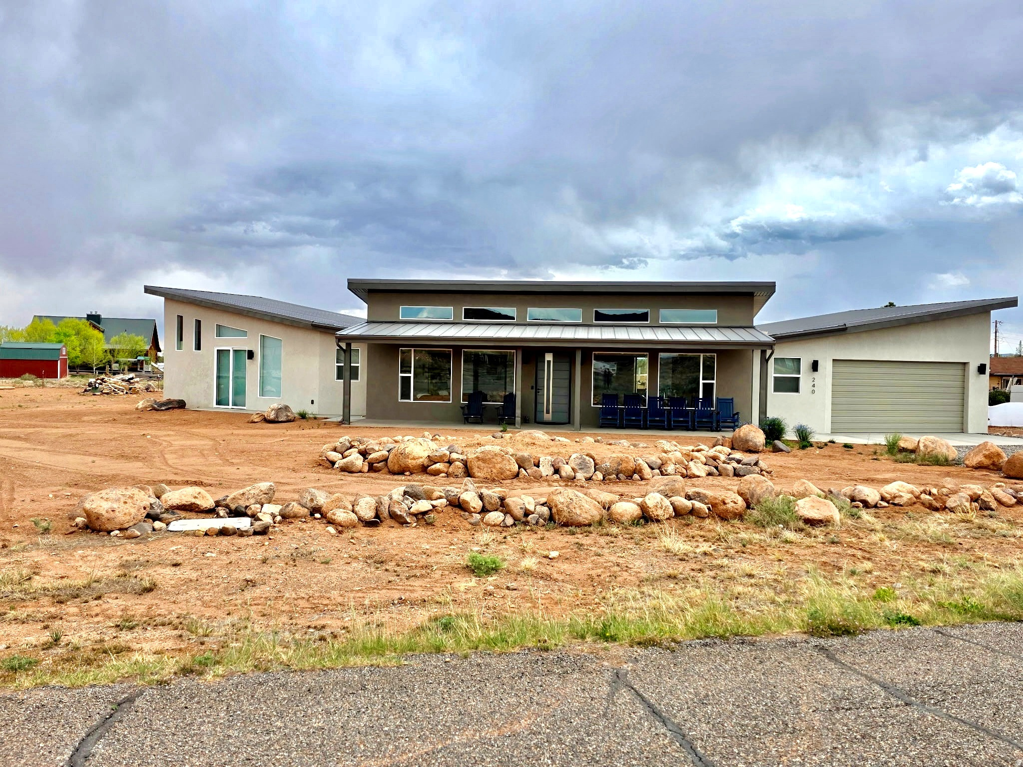 Built in 2024 by Richardson Brothers Custom Homes of St. George , this beautifully crafted 3-bedroom, 2-bath home offers incredible mountain views just minutes from Torrey and Capitol Reef National Park. Designed as a turnkey vacation home, most furnishings and household items are included. The home has been used only lightly as a vacation property since it was built and remains in excellent condition.  No corners were cut in construction, with quality finishes and thoughtful upgrades throughout, including an on-demand water heater, RV parking with 50-amp service plus sewer and water hookups, and a garage equipped with two 50-amp EV charging circuits. There may also be potential for overnight rental income, subject to buyer verification with Torrey Town.  A rare opportunity to own a move-in ready home in one of Southern Utah's most scenic destinations. Square footage figures are provided as a courtesy estimate only and were obtained from seller.  Buyer is advised to obtain an independent measurement.