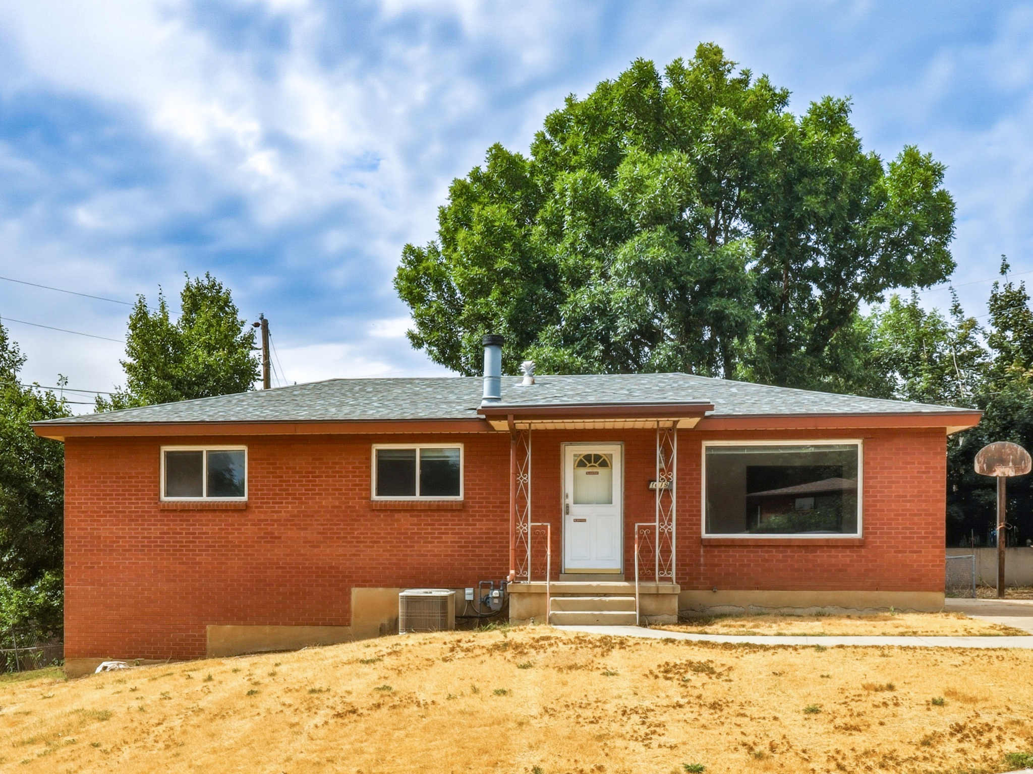 Desirable East Bountiful location! Solid all-brick home with incredible potential to make it your own. This home offers a fantastic opportunity to update and customize while building equity in one of Bountiful's most sought-after neighborhoods. The partially unfinished basement provides room to expand, and the second kitchen in the basement offers added flexibility for multi-generational living, guests, or additional functionality. Don't miss this rare opportunity to create your dream home in an established neighborhood.
