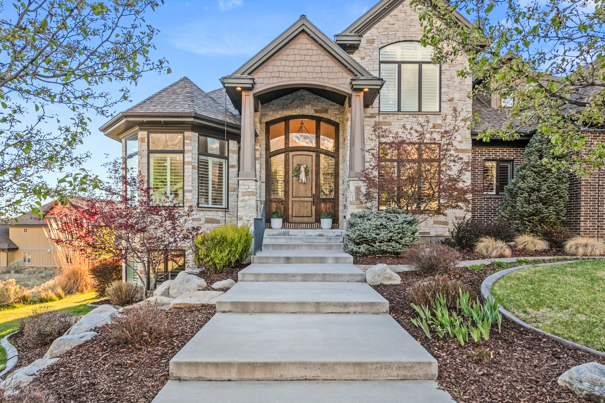 ***Join us for a public open house Saturday, May 23rd, 11 AM2 PM***  Experience luxury living in the coveted Heritage Hills community of Alpine. This exceptional estate combines timeless craftsmanship with thoughtful modern updates, including a beautifully redesigned kitchen backsplash, refreshed designer finishes, and numerous recent improvements throughout the home. Featuring nearly 9797 square feet of refined living space, the home offers 7 spacious bedrooms, multiple gathering areas, soaring ceilings, and expansive windows showcasing breathtaking mountain views. The gourmet kitchen opens seamlessly to inviting family spaces and outdoor entertaining areas, creating the perfect setting for both everyday living and large-scale entertaining. Resort-style amenities include a professional-grade indoor basketball court with hardwood flooring, a state-of-the-art theater room, fitness space, and a private mother-in-law apartment with separate access. The luxurious primary suite features a spa-inspired bath and a generous walk-in closet. Situated on a premier Alpine lot with exceptional privacy, mature landscaping, and easy access to trails, schools, and Silicon Slopes, this is a rare opportunity to own one of Alpine's standout luxury properties. Square footage figures are provided as a courtesy estimate only and were obtained from building plans.  Buyer is advised to obtain an independent measurement.