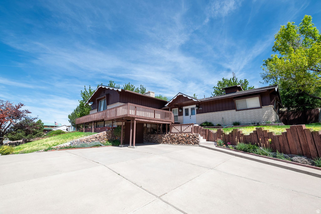 Nestled in a serene neighborhood, this charming house offers an unparalleled lifestyle with breathtaking views of the golf course and the valley below. Boasting a brand new roof that ensures ultimate peace of mind and lasting durability, this home is as structurally sound as it is beautiful. Step onto the expansive deck to soak in the stunning scenery, perfect for morning coffee or evening gatherings. The large private patio at the back invites you to enjoy outdoor entertaining or peaceful moments in the sun. Inside, the thoughtful home layout ensures comfort and functionality, making it ideal for both family living and entertaining. Just minutes from the majestic mountains, you'll find endless opportunities for hiking and adventure. With walking and bike paths nearby, you can explore the beauty of the area at your leisure. This is more than just a home; it's a lifestyle waiting for you to embrace.