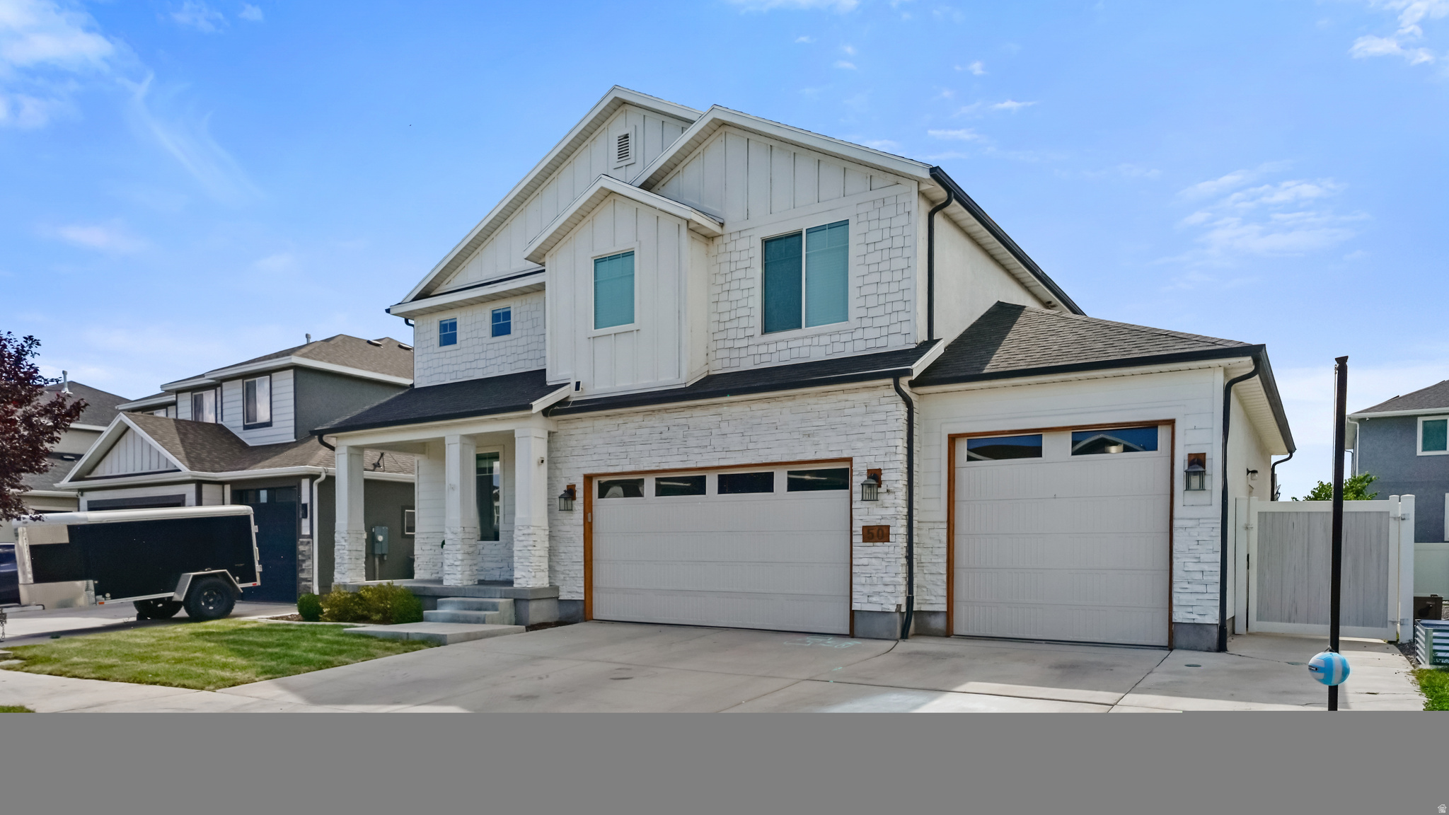Welcome to this exceptional home in one of Vineyard's most desirable neighborhoods, offering outstanding curb appeal, premium upgrades, and an unbeatable location just minutes from neighborhood parks, scenic walking and biking trails, and the beautiful shoreline of Utah Lake. Designed for both everyday living and entertaining, this smart home is packed with high-end features throughout. The spacious chef's kitchen is the heart of the home, complete with double ovens, abundant cabinetry, and plenty of space for gathering with family and friends. Downstairs, you'll find an incredible theater room featuring surround sound and a projector, creating the perfect space for movie nights, game days, or entertaining guests. A dedicated home gym provides the convenience of working out without leaving home. Step outside to your own private backyard retreat. Professionally landscaped with mature landscaping, low-maintenance artificial turf, and a massive swim spa that's included with the home, this outdoor space is ideal for relaxing or entertaining year-round. The front yard has been refreshed with new sod, while the home's custom-painted exterior adds to its distinctive appearance and exceptional curb appeal. Additional premium features include custom roller blinds throughout, an energy-efficient solar panel system, and a rare four-car garage offering abundant parking, storage, and workspace. Combining luxury, functionality, energy efficiency, and an incredible location near Utah Lake recreation, this beautifully maintained Vineyard home is truly one of a kind. Don't miss the opportunity to make it yours! Buyer to verify all listing information.