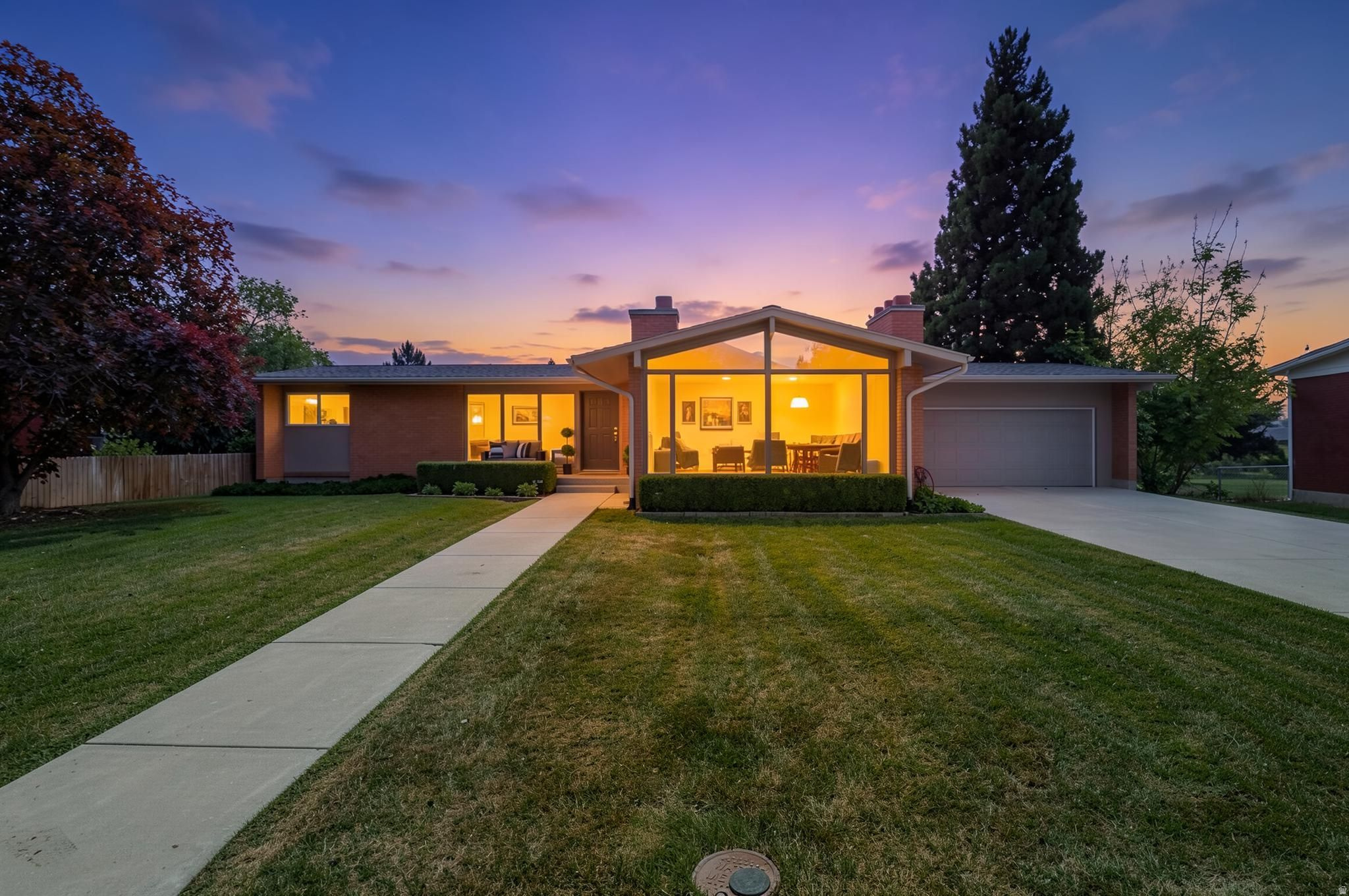 Beautiful home located in the highly sought-after Edgemont area of Provo! This bright and inviting home features lots of natural light and an open floor plan that's perfect for comfortable living and entertaining. The kitchen includes stainless steel appliances and great workspace.The property also includes a fully permitted ADU, offering excellent potential for rental income, guests, or multi-generational living. Enjoy the fully fenced yard, perfect for relaxing, pets, or outdoor gatherings.  Square footage figures are provided as a courtesy estimate only and were obtained from county records. Buyer is advised to obtain an independent measurement.