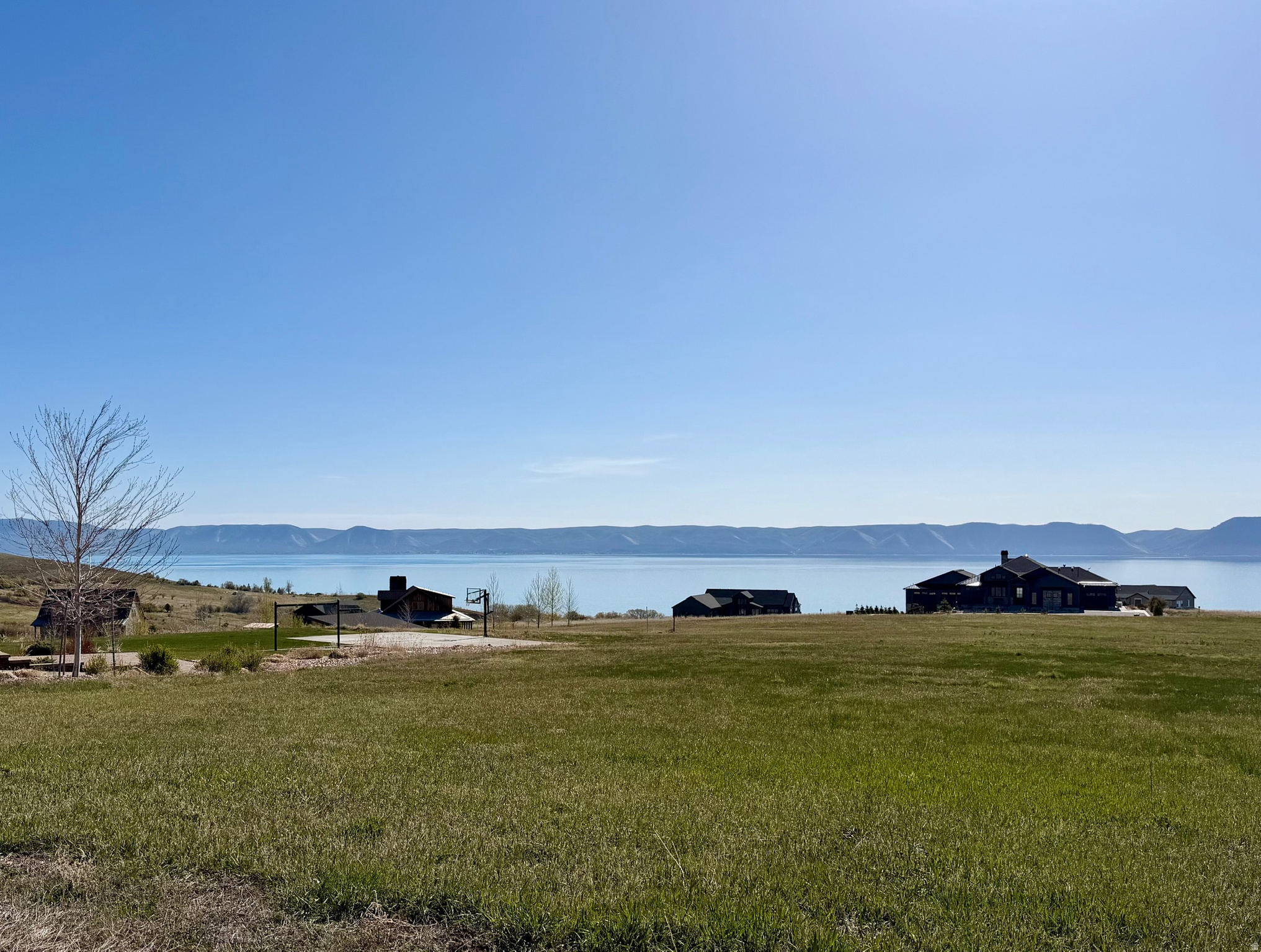 Beautiful building lot in Bear Lake, just over the Idaho border in beautiful Fish Haven.  Ride from the lot to miles of groomed trails or relax on the private beach access available to HOA members.  Short term rentals allowed.