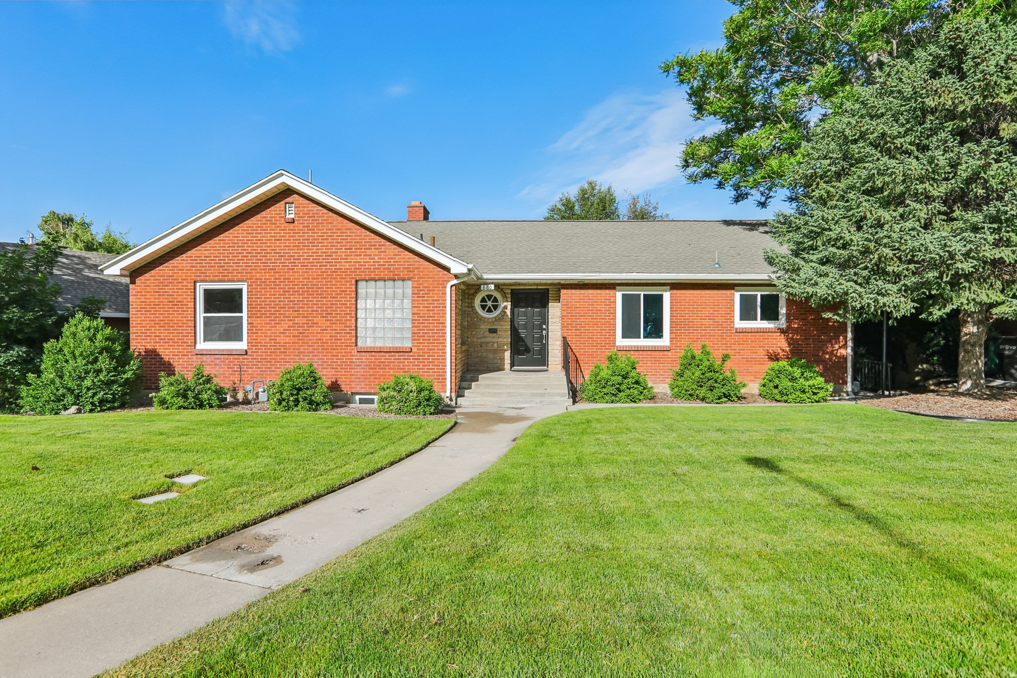 Ideally located just 3 blocks east of BYU campus, this home offers an unbeatable combination of convenience, scenery, and neighborhood charm. Enjoy being within walking distance to BYU, Kiwanis Park, and the Creamery on Ninth, with easy access to everything that makes Provo living so desirable. Wake up to breathtaking views of the Y on the mountain, perfectly framed from the kitchen window and front porch. Outdoor enthusiasts will love the ability to hike directly to the Y and nearby mountain trails, all just minutes from your doorstep. Nestled in a highly desirable neighborhood on the Provo bench, this centrally located home has been thoughtfully updated over the years for comfort and peace of mind.