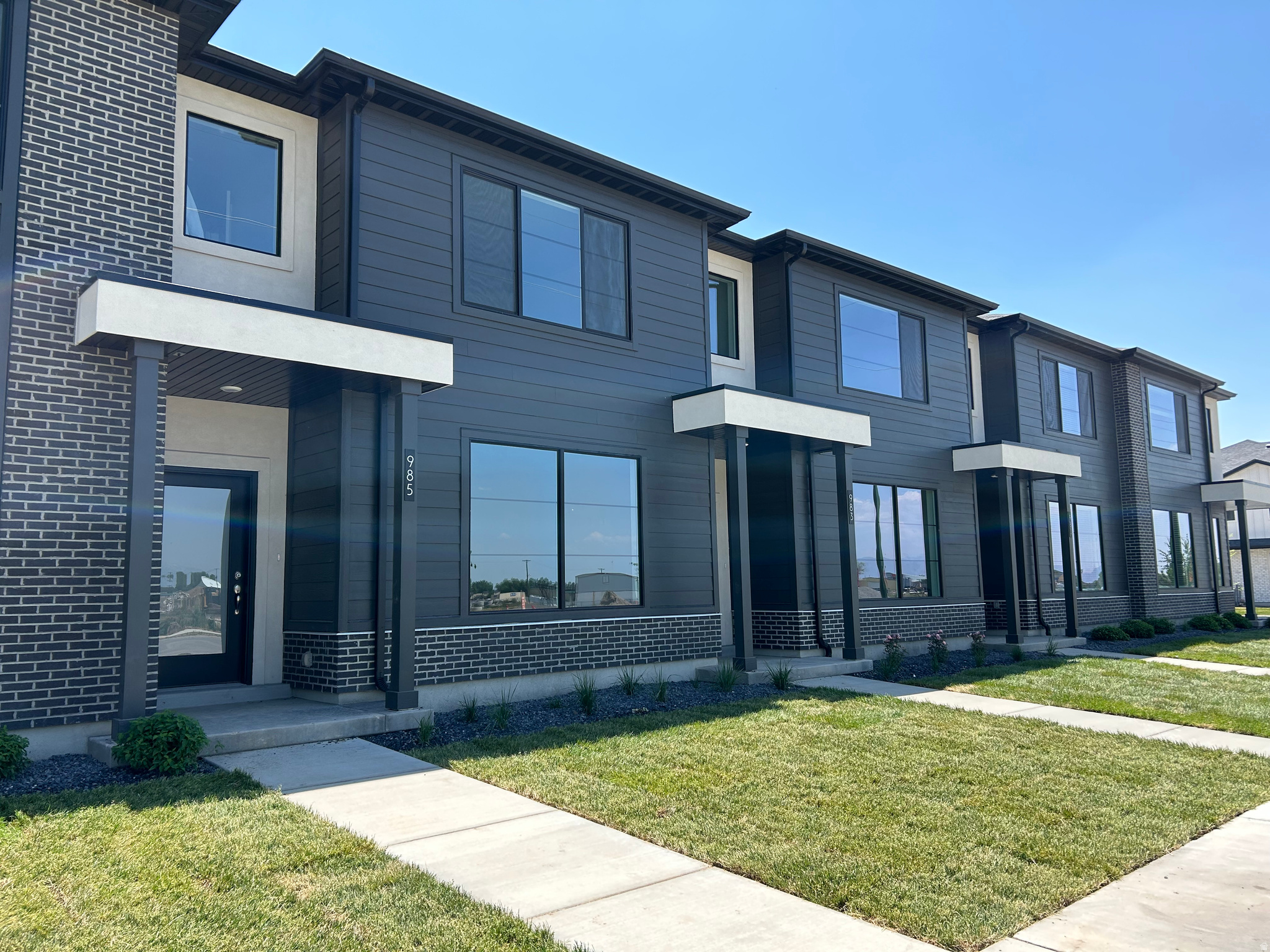 Ready for Move-In Now! Receive $12,000 incentive! Beautiful Prairie-style townhome is located in the desirable River Run Community. Home has 9' ceilings on the main level w/oversized picture windows, large, eat-in island and a super-sized pantry. Interior selections have been made by our professional designer and they are gorgeous! Upper level offers spacious owner's suite w/ spacious bedrooms and adjoining loft. All sq. ftg. is above ground. 2-car garage. Exceptional Nebo School District. Less than 1 block from brand new Spanish Fork Rec Center. Close to rodeo grounds, shopping, baseball fields and schools. Please visit our model home @ 976 S. 200 E. Spanish Fork.