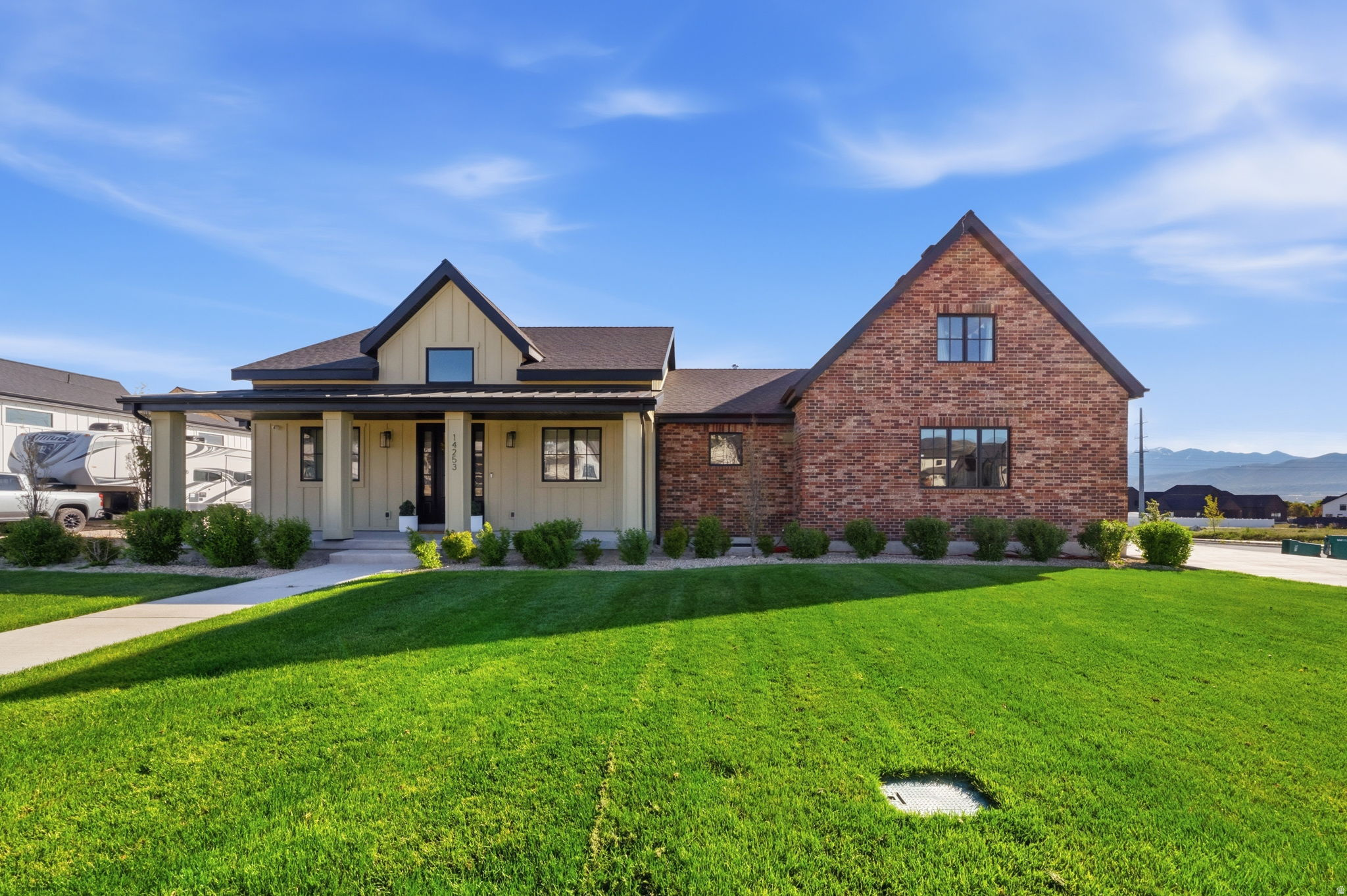 Experience elevated living in the heart of Bluffdale with this exceptional custom-built estate set on a full 1 acre lot. Offering 6,200 square feet of meticulously designed space, this impressive home features 8 generously sized bedrooms, 5 beautifully finished bathrooms, and a private office, ideal for working from home in comfort and style. Crafted with superior quality and attention to detail, the home showcases true pride of ownership throughout, from its refined finishes to thoughtfully selected design elements. The open-concept layout provides a seamless flow between living spaces, perfect for both everyday living and entertaining. A gourmet kitchen, complete with a butler's pantry, offers added prep space and makes hosting effortless for gatherings of any size. Enjoy spacious bedrooms and a highly functional layout designed for flexibility. The fully finished basement includes a private mother-in-law apartment with its own separate entrance, perfect for extended living or potential rental income. Additional features include a spacious 3 car garage, abundant storage, and ample room to create your ideal outdoor retreat. Built by Landmarks West with a custom floor plan, this home includes upgraded solid wood casement windows, exterior urethane foam insulation, and individually insulated rooms for enhanced sound control. Constructed with full solid brick (not thin brick), the home offers superior durability, energy efficiency, and sound insulation. Originally built by a contractor as a personal residence, no detail was overlooked, featuring solid wood cabinetry and solid wood doors throughout. This is a rare opportunity to own a truly custom home that blends luxury, functionality, and versatility in one of Bluffdale's most desirable areas.