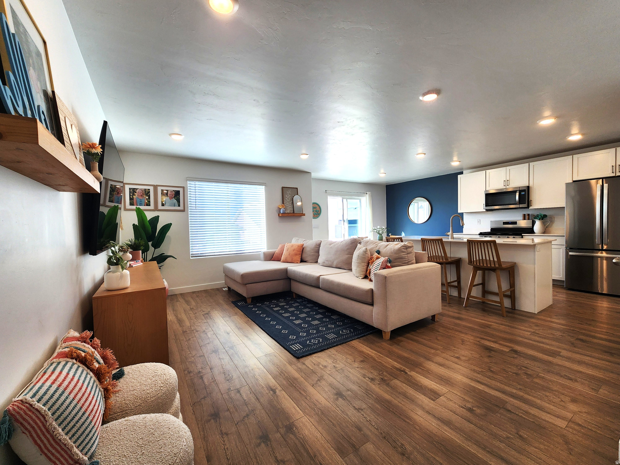 Better than new! Spacious END UNIT townhome near city center of Eagle Mtn. Looks & feels like a model home. Finished basement with options for a home based business, office or space to play. A full bathroom can be added downstairs the plumbing hookups are available under the elevated floor area. Additional upgraded shelving in pantry & laundry room. This is a MUST see opportunity!
