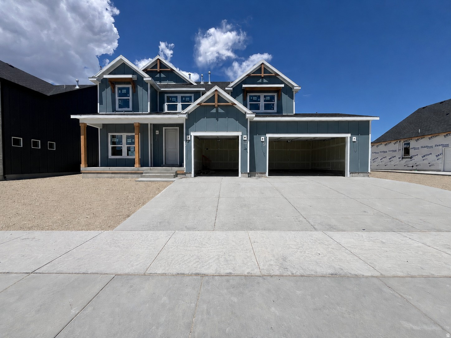 Don't miss out on this fully finished home that has been upgraded throughout with over $140,000 in options including: Gourmet kitchen - Quartz countertops - Gourmet backsplash - Upgraded cabinets - 3rd car garage - 9' ceilings on the main - Farmhouse elevation - Classy gold fixtures - LVP throughout main floor - Finished basement - Upgraded carpet and LVP. With mountain views and situated in a quiet and desirable community, this home is a must see! Close to restaurants, shopping and schools. Enjoy the community amenities: pool, clubhouse, playground and internet. July 2026 completion. *Ask about our preferred lender incentives to help you get into your dream home*