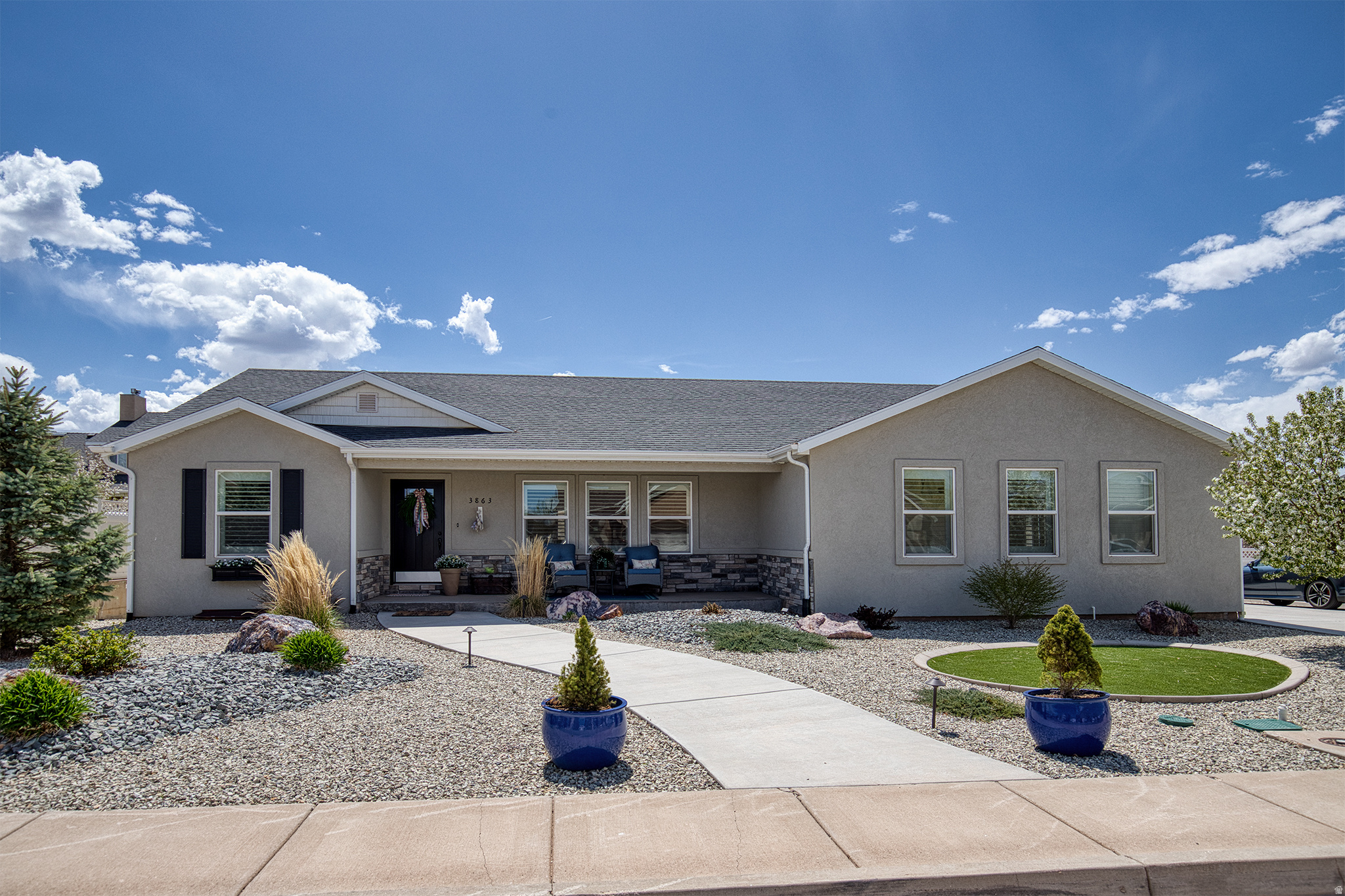 Located in the desirable Equestrian Pointe community, this immaculate home offers a vibrant lifestyle with access to pickleball and basketball courts, baseball and soccer fields, community pavilions, and scenic walking and biking trails. Step inside to an open, airy floor plan featuring vaulted ceilings and spacious living areas designed for both gathering and everyday living. The well-appointed kitchen includes a gas stove, granite countertops, a large walk-in pantry, and seamless flow into the dining and main living spaces. Recently constructed and thoughtfully upgraded, the home features a fully finished basement with a kitchenette, a beautifully landscaped yard, and over $30,000 invested in professional xeriscaping. Dual laundry rooms upstairs and downstairs add convenience, while dual water heaters enhance efficiency and comfort. Generous bedrooms, abundant storage, and a highly functional layout make everyday living easy. The expansive basement offers excellent flexibility for an in-law suite, guest quarters, or multi-generational living, with potential for a separate entrance. Outdoor living is just as impressive, with full irrigation, raised garden boxes, a stunning covered patio, and a welcoming front porch. A side-load garage and RV parking complete this exceptional property, offering the perfect blend of comfort, space, and functionality.