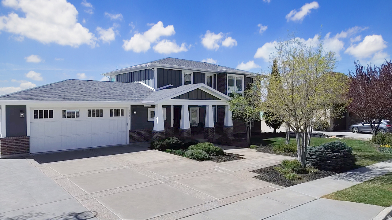 Experience breathtaking panoramic valley and mountain views from this beautiful custom home in the exclusive Deer Crest neighborhood. Designed with exceptional attention to detail, this home features a stunning kitchen, six spacious bedrooms, two family rooms, a flex room, and a workout space, with views from nearly every window.  The fully finished walkout basement includes an under-garage storage bay, adding both function and flexibility. There is also access to the basement through the garage. Move-in ready and truly one-of-a-kind. This is an opportunity you won't want to miss.