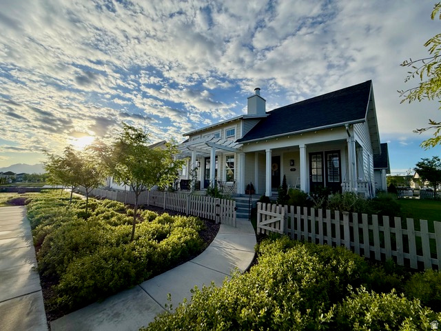Situated on a Corner Lot in a beautifully & thoughtfully Landscaped and Manicured neighborhood in Daybreak's Exclusive Island Community. A Lovely Lakeside Retreat next to The Crown Jewel of Daybreak - Oquirrh Lake. Expansive Porch & Patio offer outdoor living spaces with picturesque Waterfront & Mountain Views. Steps away is the Community's Private Beach, Pavilion & Seating complete with a Lakeside Breeze! Bright & Open Great room showcases extra high Post & Beam Ceilings, Chic Lighting Fixtures & Clerestory windows Drench the space with Natural Light. Spectacular Kitchen boasts Large Island, White Quartz Countertops, Double Oven, Display Shelves, a Farmhouse Sink, Upgraded Stainless Appliances & Countertop Range. Fenced Back Yard & Covered Patio offer Premium Entertaining Spaces with a built-in Coyote Outdoor Grill. The Primary Bed/Bath Suite boasts Stunning Euro Shower with Marble Tile, Separate Soaking Tub, Large Double Vanity, Extra Storage Space and Generous Walk-In Closet. Bonus Features are: Multiple Flex spaces for exercise, Music Room, Toy Rooms, Dual Furnace, Tankless Water Heater & Rough-in Plumbing for optional Kitchenette. This Lifestyle is Like Living Full-time at a Luxury Resort! All of Daybreak's unparalleled Amenities Become Yours to Enjoy - Swimming Pools, Oquirrh Lake's Private Eastlake Beach Park & Dock, Miles of Hiking/Biking Trails, Award Winning Schools, Community Gardens, Downtown Daybreak Shopping/Dining, Daybreak Library & More! Come TOUR and FALL IN LOVE with this Amazing Property.