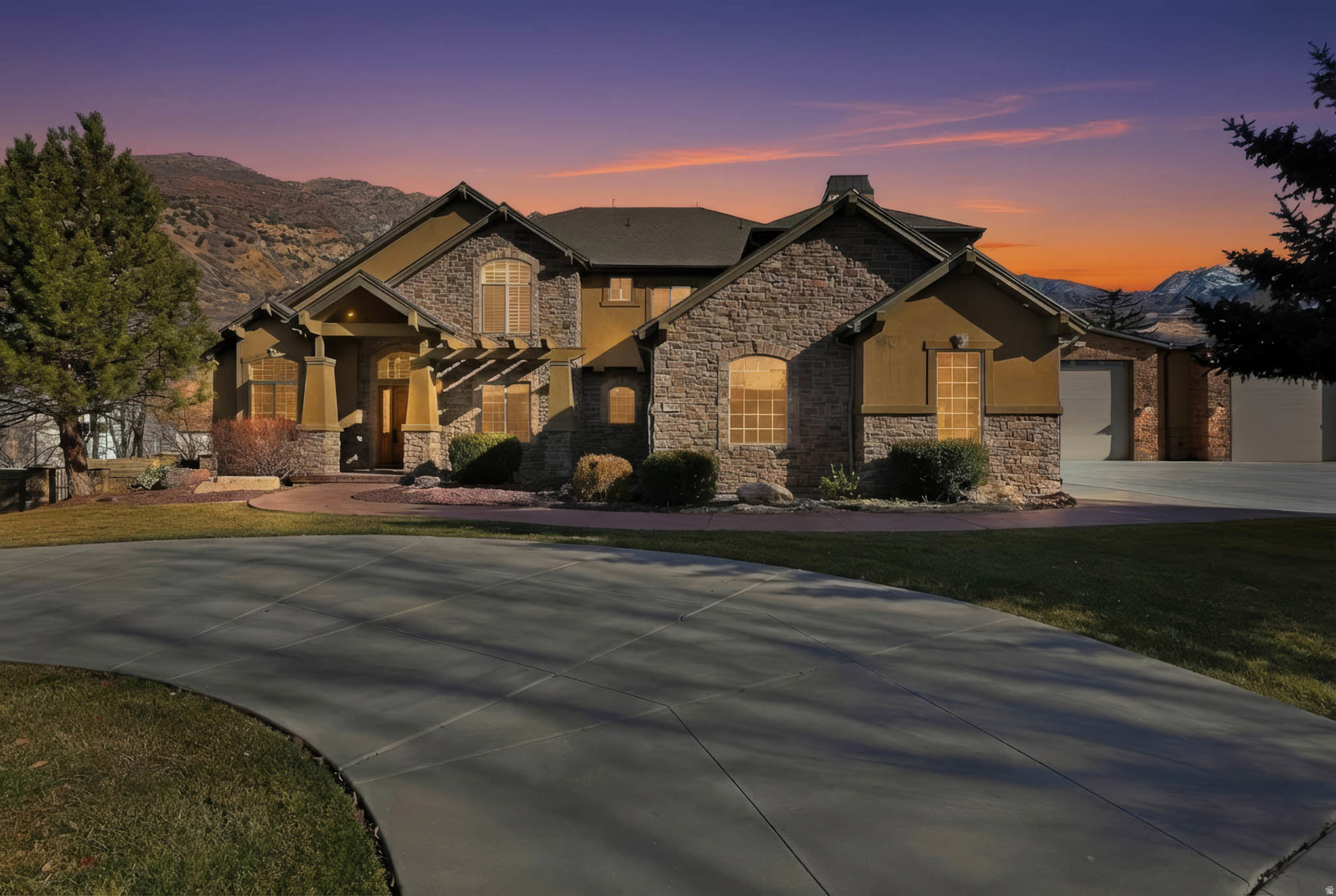 This gorgeous, traditional 2-Story home with Amazing 9000 sq ft Garage on an 11/2 acres in Holladay!   This amazing floor plan also offers 7 bedrooms, 5 baths, 3 jacuzzi tubs. The large kitchen opens into the great room which walks out into a covered patio &  large pool area featuring Mountain View's. This & so much more makes entertaining a breeze.  Primary en-suite is located on the second floor. This relaxing,  private sanctuary comes with a balcony and fireplace.  Recently built Detached garage features 16 foot doors and 20 ft ceilings 9000 square feet. Words are not enough, check out the photos.