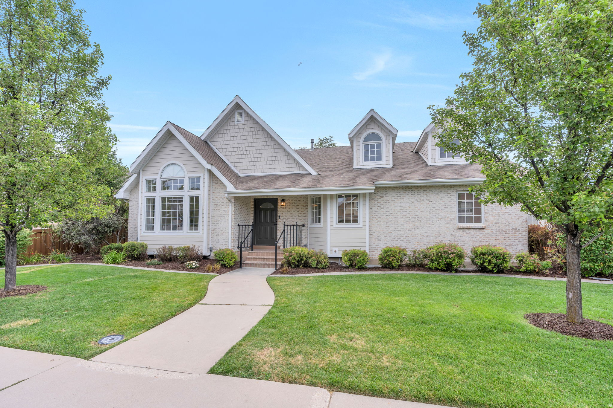 Welcome to this stunning, fully remodeled 5-bedroom, 5-bathroom home that perfectly blends timeless elegance with modern comfort. Bathed in natural light, every room showcases thoughtful updates, beautiful hardwood floors, and exceptional craftsmanship throughout. Designed for both everyday living and effortless entertaining, the spacious floor plan features expansive living and gathering areas that create the perfect setting for hosting family and friends. The inviting family hangout loft offers a versatile retreat for movie nights, gaming, or relaxing, while the stylish wet bar adds an extra touch of luxury for entertaining. Step outside to enjoy the beautifully landscaped grounds, where mature greenery and meticulously maintained outdoor spaces provide a peaceful backdrop for gatherings or quiet evenings at home. Ideally located with convenient access to shopping, dining, parks, schools, and major commuter routes, this exceptional home combines luxury, functionality, and an unbeatable location. With five generously sized bedrooms and five beautifully updated bathrooms, this move-in-ready residence offers the space, style, and amenities today's buyers are looking for. Don't miss the opportunity to make this extraordinary home your own!