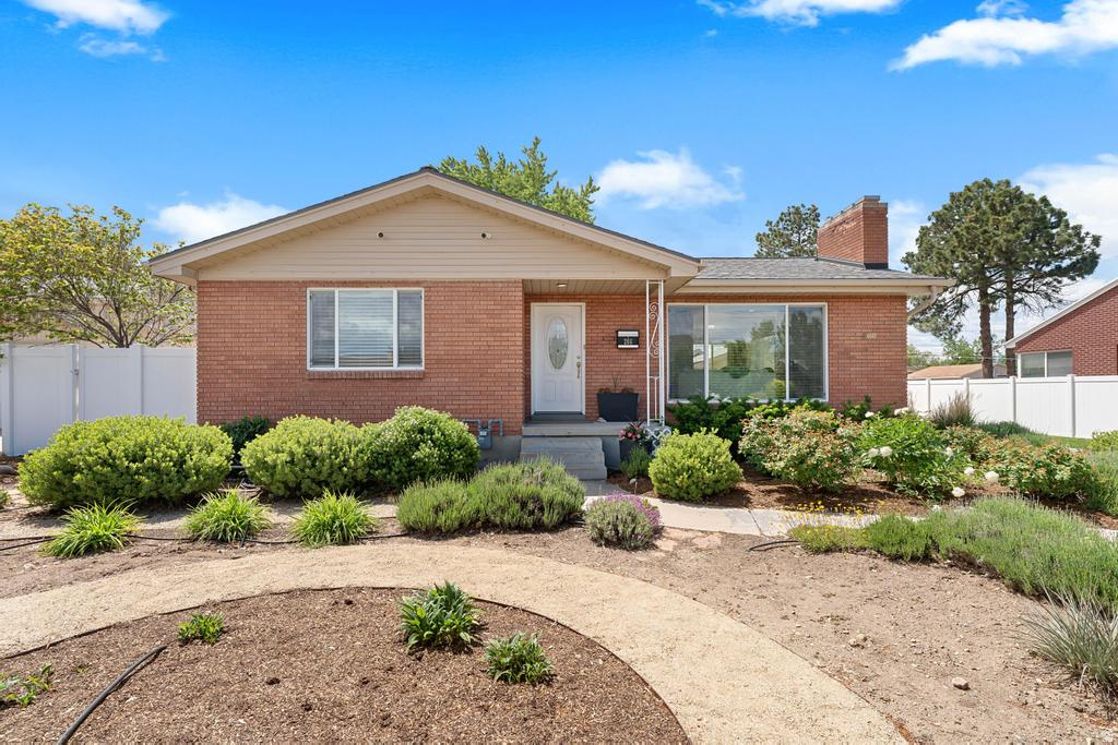*** OPEN HOUSE SATURDAY MAY 30TH 3PM-5PM *** Located on a quiet street in one of Midvale's most sought-after neighborhoods, this 4-bedroom, 2-bath home has the kind of setup people are actually looking for. Updated kitchen and living spaces, mature trees, a killer backyard, and enough garage/storage space for all the stuff you swear you'll organize someday. Inside, the kitchen and living room have been updated with a clean, comfortable feel that doesn't look like a flipper went wild at HomeGoods. The layout just makes sense-functional, open, and easy to live in. Out back is where this place really shines. Fully usable yard with mature trees that somehow survived Utah developers, a pergola for summer nights, a storage shed, and a large detached 2-car garage with tons of extra space for toys, tools, projects, or your future gym you'll use twice in January. The backyard feels private, shaded, and actually enjoyable instead of just "technically there." Located close to shopping, restaurants, freeway access, and mountain recreation, you're near everything without feeling packed on top of your neighbors. Homes in this area don't come up often because once people get in, they usually stay.