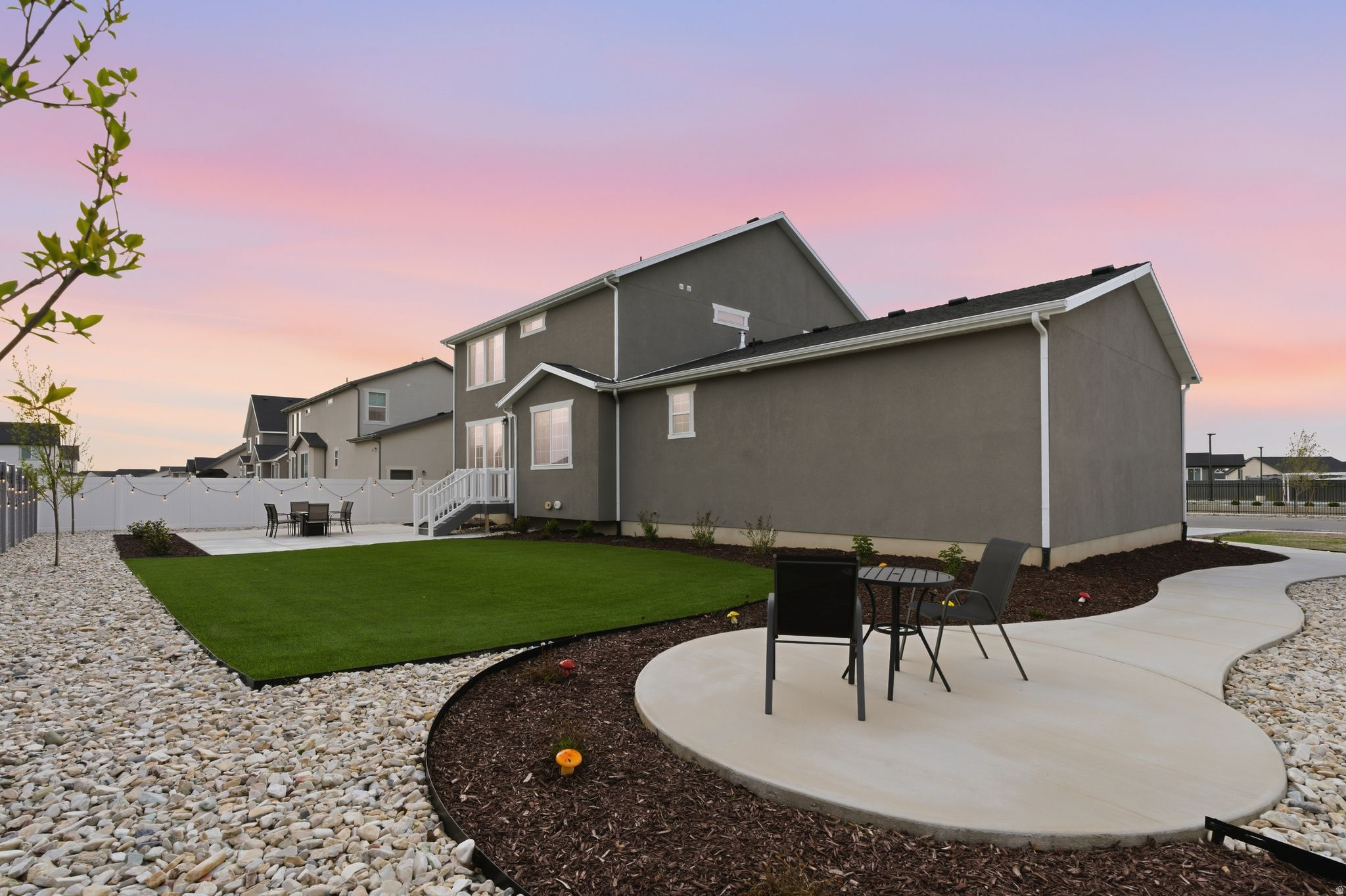 OPEN HOUSE Saturday, May 30th- 12PM-3PM!!  Seller relocating out of state for work-START AHEAD-NOT FROM SCRATCH Priced in line with base-level new builds in Clinton, this nearly new home stands out with upgrades already done for you. Enjoy the value of a new build at the original purchase price, plus a fully landscaped backyard featuring automatic irrigation, xeriscape plants, large turf area, trees, and lighting. The front yard is mostly complete and ready for your personal touch. Inside, you'll love the whole-home water softener, kitchen sink filtration system with fridge connection, upgraded electrical panel, added basement outlets, upgraded main garage door with exterior keypad, and hardwired Ring doorbell. A move-in-ready opportunity at an incredible price!