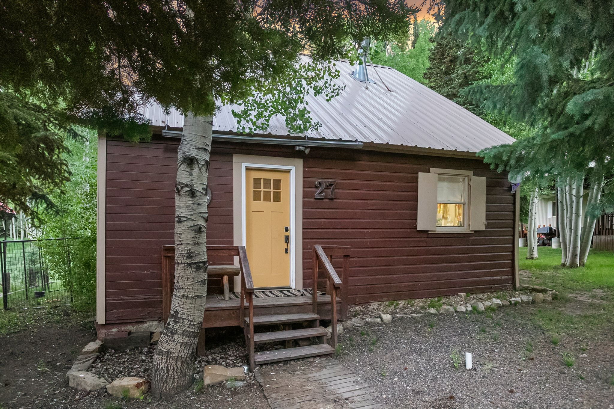 SELLER OFFERING $9k in Buyer Closing Costs with full-price offer! Priced to sell! Extremely rare opportunity to own one of just 52 private properties in Clear Creek - a former 1870s logging and mining town turned exclusive cabin community!  These historic homes offer unmatched recreational access, just minutes from Electric Lake and Scofield Reservoir. Roads are plowed, and utilities are available for year-round use! Breathe in the crisp mountain air, take in the wooded mountainside views of Straight Canyon, and enjoy the nostalgic charm of a bygone era. The soothing sounds of Mud Creek, running year-round through the grassy backyard, create a serene atmosphere. With uninterrupted forest views behind the home, you'll enjoy a level of privacy that few properties can offer. This well-loved and cared-for home is being sold fully furnished at the list price. Located just 75 minutes from Spanish Fork, an hour from Price, and two hours from Salt Lake City. Enjoy 508 acres of community common area, OHV riding, hunting, fishing, boating, and winter sports - all without the restrictions of an HOA. This property offers a perfect blend of natural beauty, abundant wildlife, outdoor adventure, and rustic historical charm!