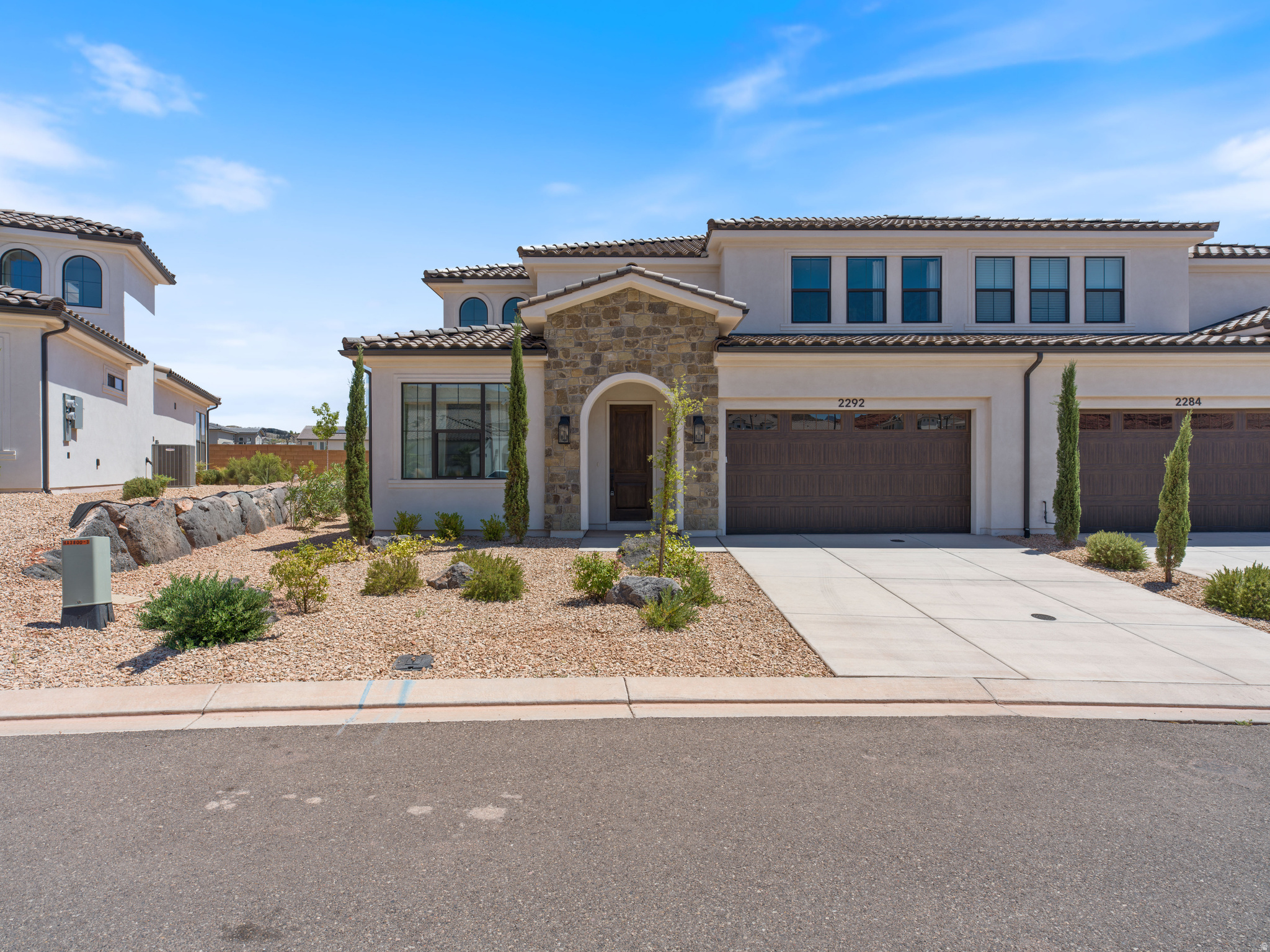 ZONED SHORT-TERM RENTAL- Back on market and improved price! Located in the new and highly desirable Sendera community in Washington, this 5 bedroom/5 bathroom home was the model home for the builder. It is upgraded to the highest level throughout. Each room is a mini-suite, with a private bathroom for each room- perfect for nightly rentals. Due to it being a model home, it has never been rented out. Situated in a prime location- directly across from the community pool and extra parking. This house is quiet and private while being less than 5 minutes from I-15. This is a rare opportunity to own a fully upgraded former model home in one of the most popular and sought-after communities for nightly rentals. Model furniture is not included and priced below market for quick sale.