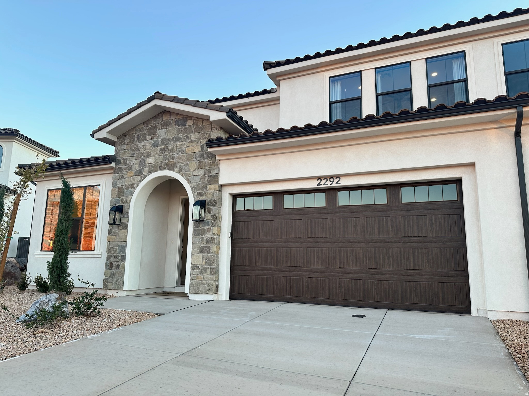 ZONED SHORT-TERM RENTAL- Back on market and improved price! Located in the new and highly desirable Sendera community in Washington, this 5 bedroom/5 bathroom home was the model home for the builder. It is upgraded to the highest level throughout. Each room is a mini-suite, with a private bathroom for each room- perfect for nightly rentals. Due to it being a model home, it has never been rented out. Situated in a prime location- directly across from the community pool and extra parking. This house is quiet and private while being less than 5 minutes from I-15. This is a rare opportunity to own a fully upgraded former model home in one of the most popular and sought-after communities for nightly rentals. Model furniture is not included and priced below market for quick sale.