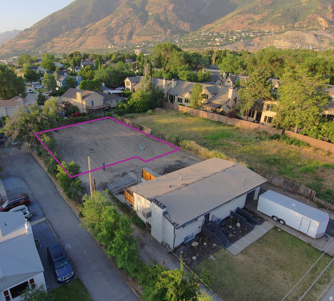 BRING YOUR OWN BUILDER. Rare opportunity to build your dream home on this exceptional Cottonwood Heights lot with stunning mountain views. Ideally located minutes from Big and Little Cottonwood Canyons with world-class skiing, hiking, and biking. Quick freeway access to downtown Salt Lake City and the airport, and close to Holladay's shops and restaurants. Secluded flag lot offers privacy while remaining centrally located. Water and sewer are stubbed to the property, gas conduit installed from Fort Union Blvd to the lot. Access via shared private driveway. Includes landscaped stormwater detention area as part of approved site drainage design.