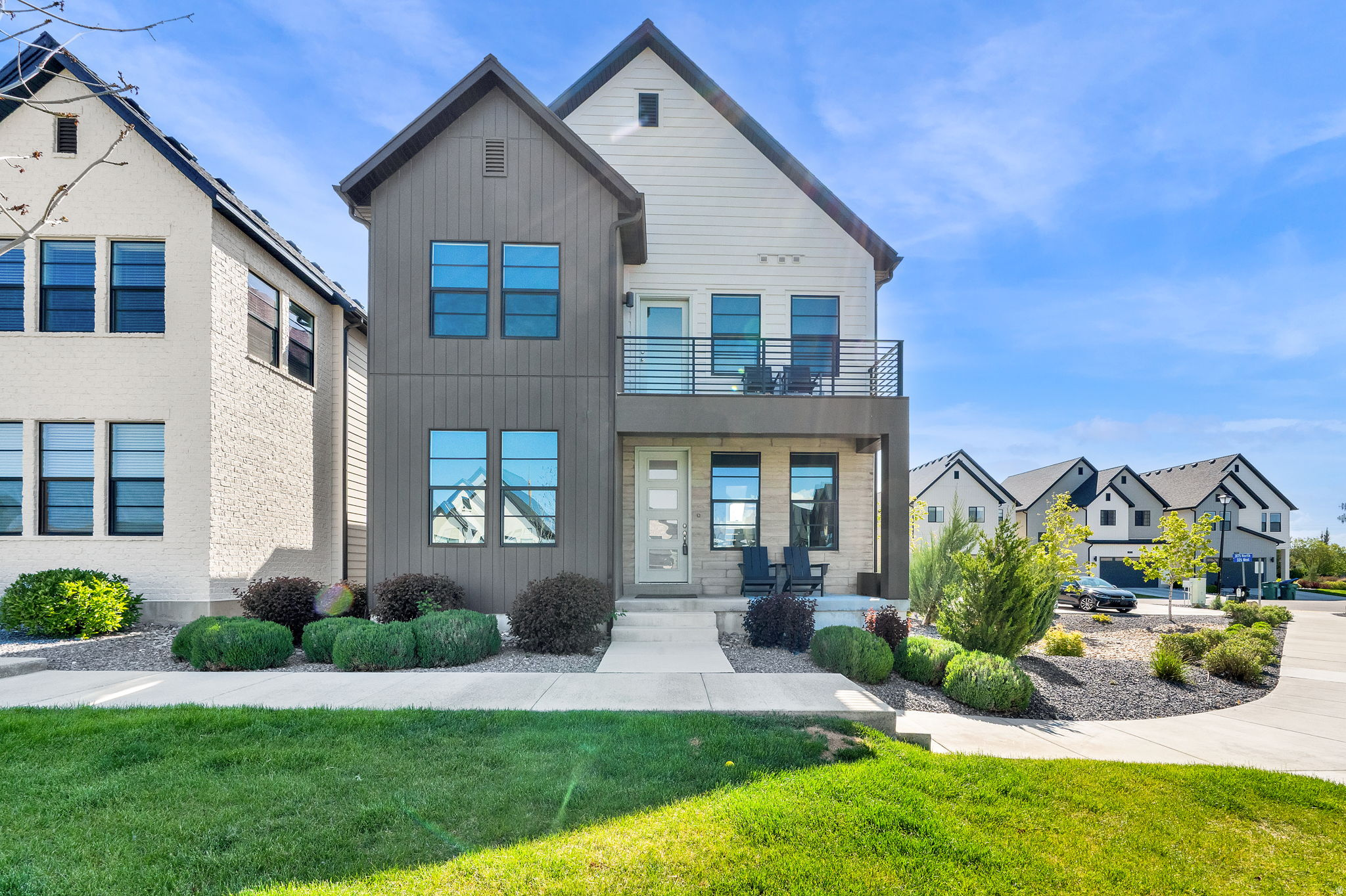Welcome to this nearly new home in the highly sought-after Ivory Ridge community, where lifestyle, convenience, and modern design come together seamlessly. Ideally situated on a desirable interior lot, this home faces a peaceful open green space with a playground just steps away... perfect for relaxing, playing, and everyday enjoyment.  Inside, you'll appreciate the bright, open layout filled with natural light and versatile living areas designed for today's needs. The finished basement and additional family room (includes rough-in for potential future bathroom) provide flexible options for a guest suite, home office, or media space. The primary suite features a private balcony, an ideal spot to start or end your day. Upstairs, you'll also find a convenient study area and laundry room.  Enjoy added comfort in the living and dining areas with electric shades on the west-facing windows, helping manage afternoon sun while maintaining a bright, inviting atmosphere. Water softener included, offering enhanced water quality and added convenience for everyday living.  The attached 2-car garage adds everyday convenience along with visitor parking right next door including community charging stations for electric vehicles.  This home places you right in the heart of an active and amenity-rich neighborhood. Enjoy close proximity to the Ivory Ridge splash pad, parks, and open green spaces.  Nearby top-rated schools, including Skyridge High School and Eaglecrest Elementary, are just a short distance away.  You'll also love the convenience of being near Silicon Slopes, with quick access to shopping, dining, and major employers, along with outdoor adventures in American Fork Canyon and nearby trail systems. Commuting is simple with easy access to I-15 and Timpanogos Highway.  Skip the wait and uncertainty of building this beautifully finished home is ready for you to move in and enjoy from day one!