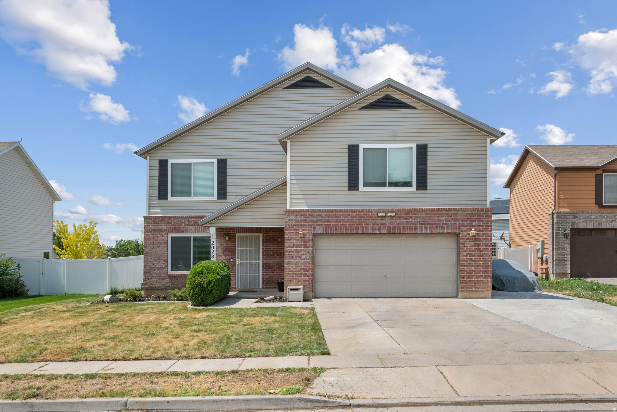 PRICED TO SELL!  This well-maintained Clearfield home offers peace of mind with a new roof (2020), energy-efficient windows (2022), tankless water heater (2022), like-new carpet (2021), and beautifully remodeled primary and main bathrooms (2023). Upstairs you'll find three spacious bedrooms, each with large walk-in closets. Step outside to a huge covered patio with a pergola-the perfect place to entertain or unwind.  Need room for your toys? The impressive 55-foot RV parking provides plenty of space for your RV, trailer, or additional vehicles. The current family room can easily be converted back into a fourth bedroom, giving buyers flexibility to fit their needs.  **All information deemed to be reliable. Buyer and buyers agent to verify square footage and all information.