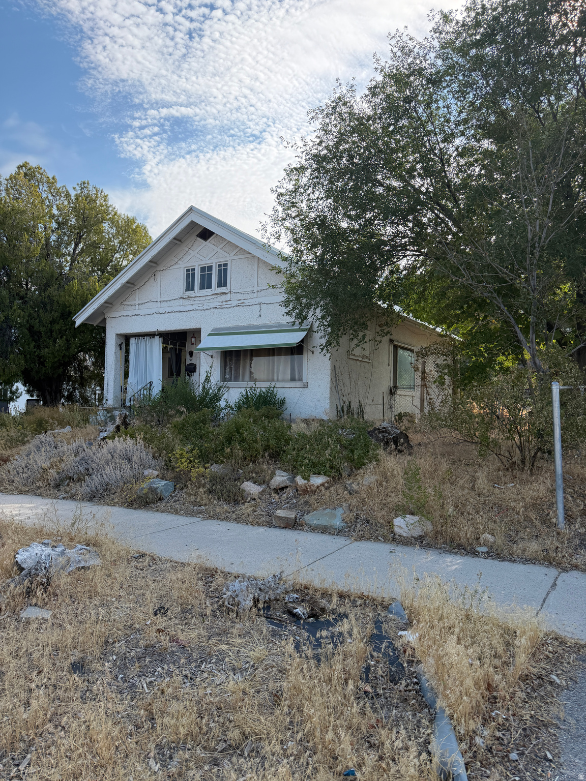 This property has so many different possibilities.  Located close to downtown and within walking distance of most amenities it is perfectly positioned for someone looking to stay close to town.   It also is zoned commercial and so the possibilities for that are almost endless.   Make your appointment to see this home today.