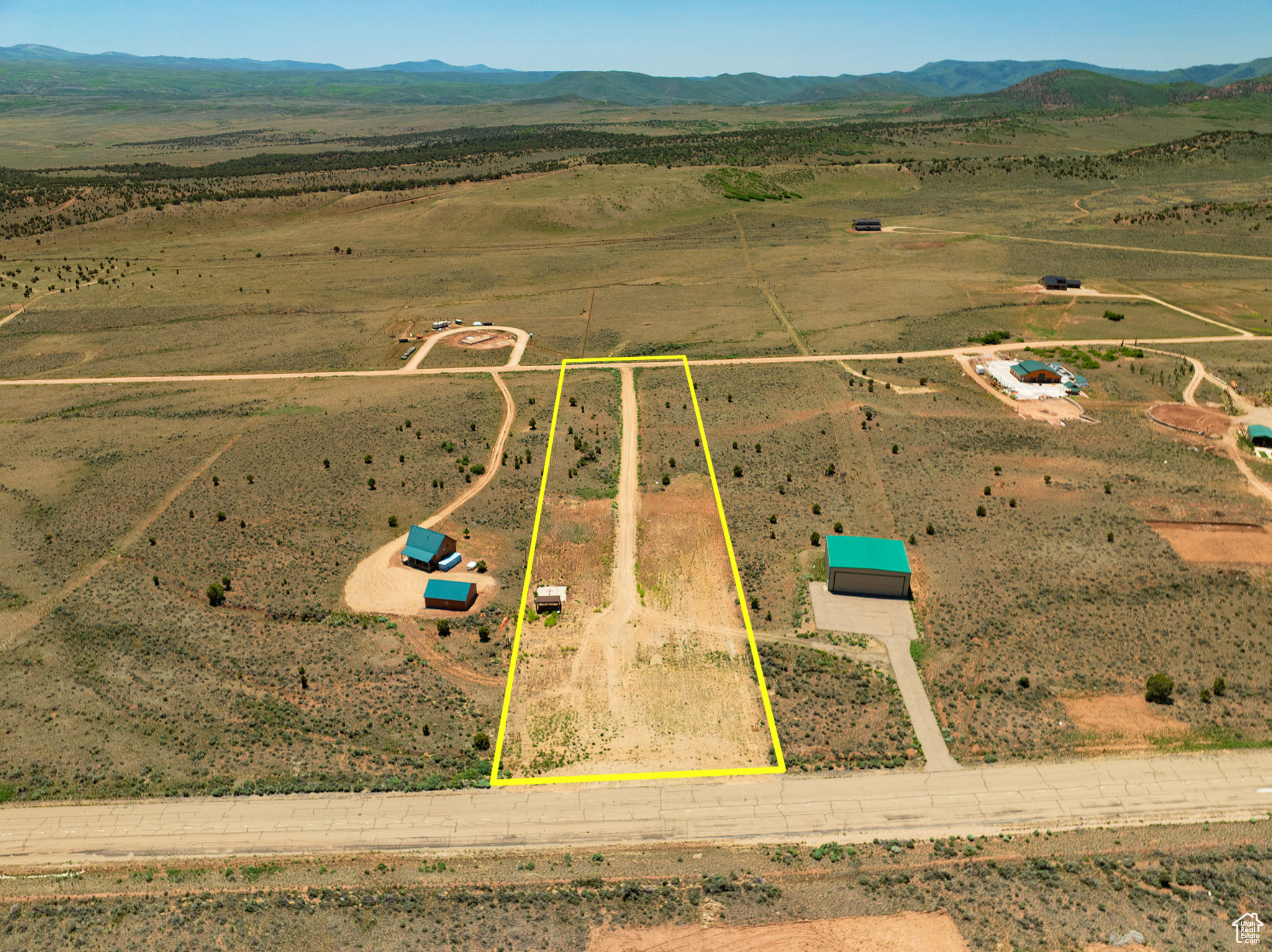 * Nice Flat/Graveled 5 Acre Lot on Thunder Ridge/Airport Rd in Bandanna Ranch Thunder Ridge * Power already connected! * Very large taxi/driveway running all the way through the lot to the runway! * Includes: Community Area with Large Gazebo for shade & a sweet basketball court! * Perfect for building your dream cabin in a private airpark! * Great views of the mountains and valleys! * City Water available at buyers expense & Septic Systems available * Year-round access! * Property touches the Thunder Ridge Airpark Runway for small planes and this land has served as a community area for people to fly in, take a break in the shade & play a game of basketball! * Take a breath of fresh mountain air, enjoy the peace & quiet with the beautiful starry skies at night!! * Within minutes of Red Creek Reservoir which is perfect for kayaking, paddleboarding & fishing! * Located less than 30 mins from Strawberry Reservoir, Current Creek, Starvation and many lakes & rivers! * Bandanna Ranch borders thousands of acres of BLM Tabby wildlife management public lands! * This is an outdoor paradise with all the endless miles of 4wheeling, boating, biking, hiking, fishing, camping & RV adventures you can imagine! * HOA maintains roads all year-round & provides common garbage bins for full time living possibilities! * Check out https://www.thunderridgeairpark.com/