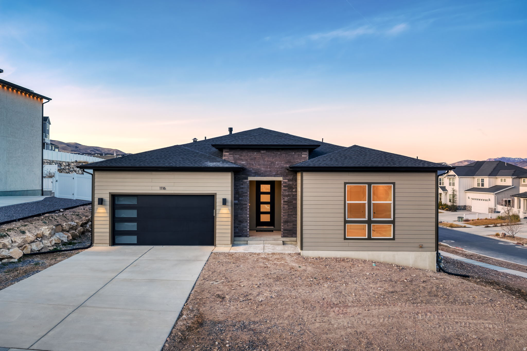 Welcome to luxury single-level living in Saratoga Springs, Utah in the scenic Westlake Vistas neighborhood. This 6 bedroom 4.5 bath new construction home offers over 4,000 square feet of thoughtfully designed living space with 10' main floor ceilings, 8' interior doors, and an open-concept great room centered around a cozy fireplace, creating a bright, elevated feel throughout the home. The gourmet kitchen with oversized island and walk-in pantry connects seamlessly to the dining area and main living space, while a multi-slide glass door opens to a covered patio, blending indoor comfort with outdoor entertaining. Positioned near trails, parks, shopping, and shoreline recreation at Utah Lake, this move-in-ready home offers the rare combination of single-story convenience + finished basement flexibility in one of Saratoga Springs premier hillside neighborhoods.