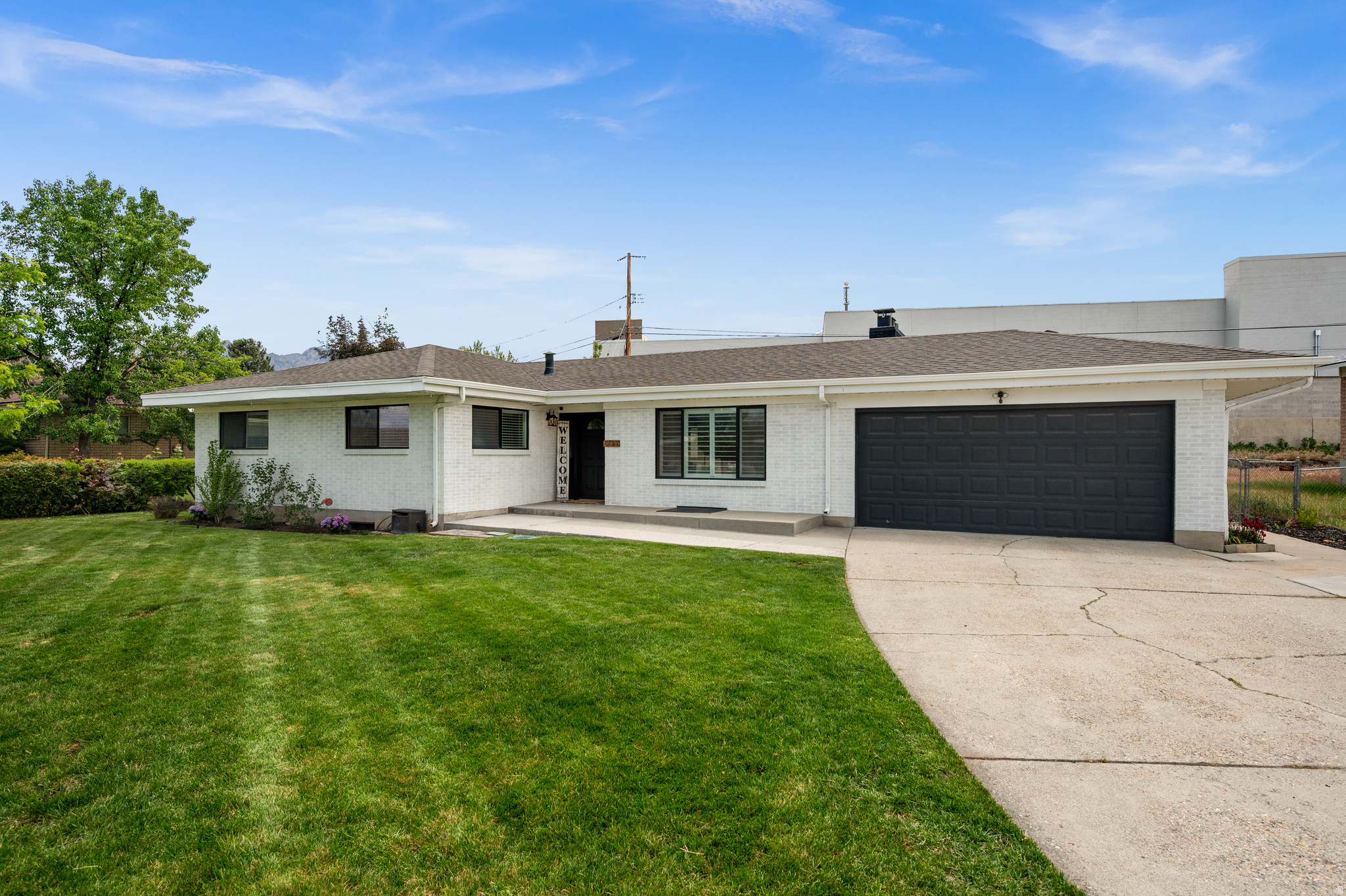 Welcome to this tastefully updated Rambler in Sandy! Once you walk into the home you will enjoy all the natural light pouring in from every direction (almost every direction, we have to be literal here) with the sunlight shining (or moon light gazing) you will gawk at the updated kitchen thinking how nice it would be to just have a moment to sit down at your very own private island, the kitchen island that is. The stainless steel appliances are sure to catch your eye as you glance over to the left to notice the gas range with its very own faucet to fill pots with! If you are the social butterfly type you will most certainly enjoy hosting game night in your spacious living room with a fire crackling in the background or if you prefer BBQ's then head on out to your amazing covered back patio! This home has an excellent floor plan keeping in mind the need for 3 bedrooms upstairs. Walk down to the basement and step into the large family room perfect for movie night or pulling out all of the kids toys and help them create their very own wonder world or Lego Land (just make sure to keep your shoes on). The basement is a walk-out basement with a mud room area with ample storage, 3 additional bedrooms and a full bathroom. If a collection of automobiles is a concern then you have come to the right spot! The driveway is large and does have room to fit multiple cars or any other item that is suited for off street parking! The house is close to both shopping and restaurants. A short drive and you will be cruising on the freeway with the wind in your hair. This home is excited for the next set of memories that will come its way. It has served it purpose for the current family and is excited for the next resident(s) as the current owners journey continues on in their next forever home as they move to a little less snowy location.