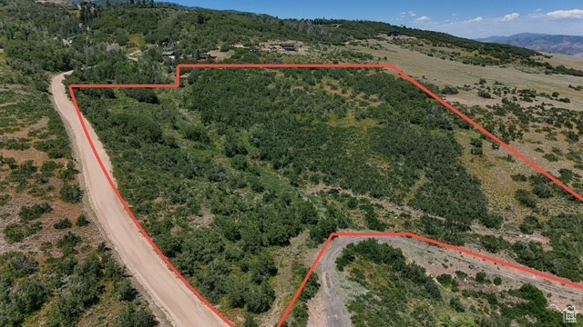 HUGE PRICE REDUCTION! Take I-80 East to Exit #150, Promontory/Tollgate Canyon, and drive just over a mile up the Forest Meadow side of the ranch. Take it in and breathe because this property is so stunning and has gorgeous views from every corner. Sitting outside the Pine Meadows Ranch Homeowners Association, while enjoying the masterfully groomed road, this easy year-round access in your dream home location will blow you away. Views to the Uinta's, Kamas Valley, Park City, and Deer Valley Ski areas, and the valley views below these pristine mountains won't disappoint. The hardest part about building on this luxurious parcel is going to be "where am I going to build"?  Because the options are limitless. Give me a call today and let's go for a long walk across this gorgeous property.