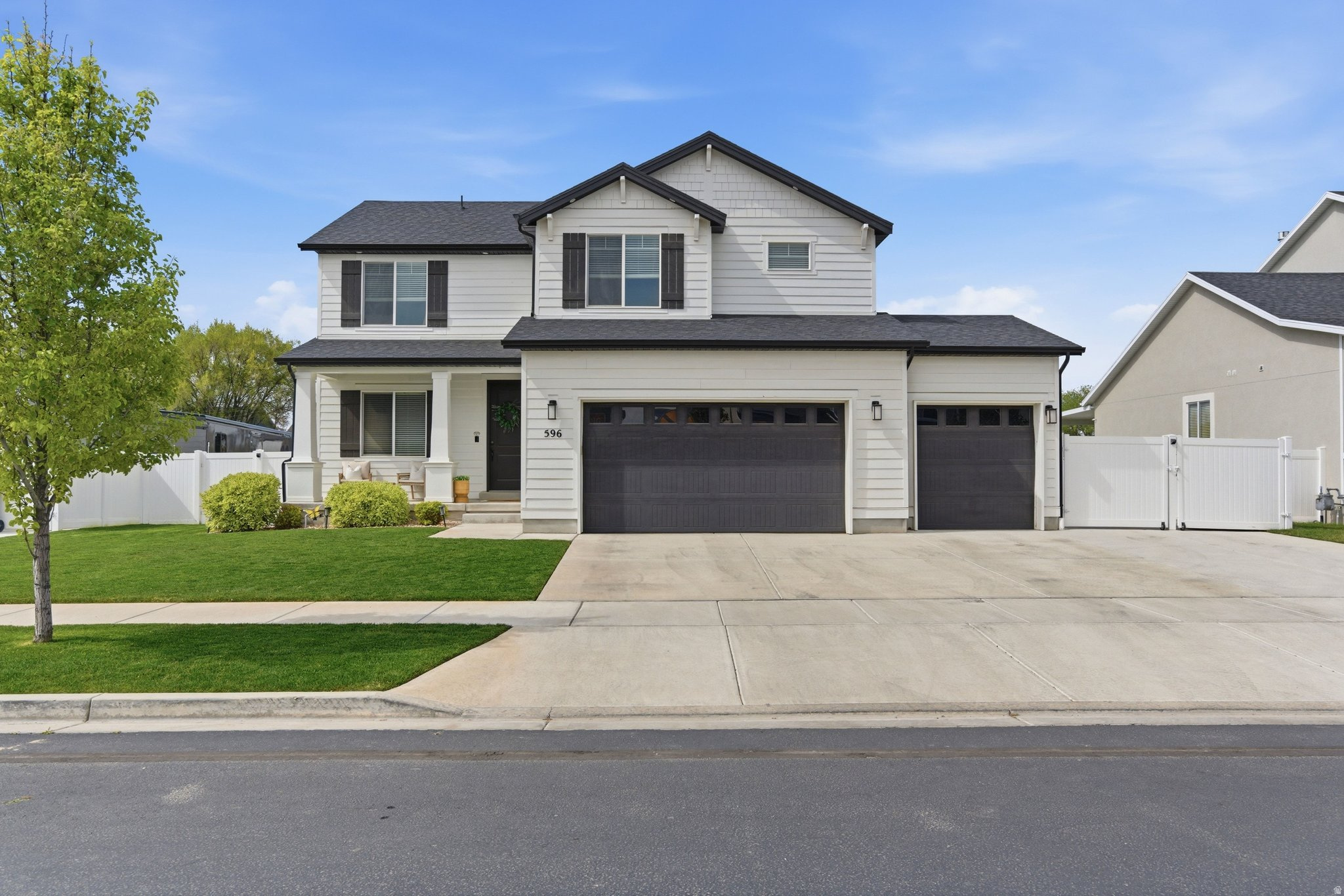 Gorgeous home at an amazing value! You won't find a better deal in the neighborhood with all the beautiful features and upgrades of this home inside and out! Enjoy the best of both worlds in beautiful Mapleton-peaceful rural living with modern conveniences just minutes away. This stunning 5 bedroom, 3.5 bath designer's home is filled with gorgeous, high-end features, including quartz countertops, double ovens, a gas cooktop, a cozy fireplace, a thoughtfully designed built-in office space as well as a beautiful mudroom that adds both style and everyday functionality. Step outside to an exceptional private outdoor living space featuring a covered patio, playground, in-ground trampoline, and a fully fenced yard, perfect for entertaining, play, and relaxation. The 3 car garage is extra deep providing ample room for a full size truck. This home offers comfort, style, and space in a setting you'll love coming home to.