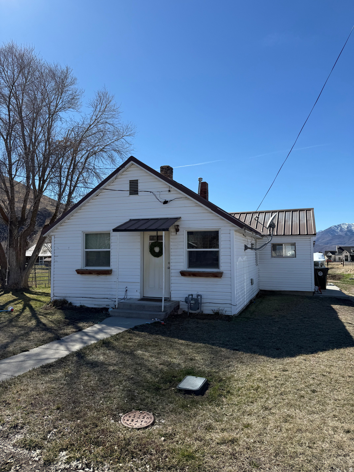Enjoy the peace and quiet of country living with this charming 2-bedroom, 1-bath home located on .38 acres in scenic Heber City. Set in a calm and spacious area, this property offers a rare opportunity to enjoy open space, mountain surroundings, and a slower pace of life while still being just minutes from town amenities.  Located at 3224 S Daniels Rd, the home features several recent upgrades, including a new furnace and a new water heater, providing comfort and peace of mind for the next owner. Also features a spacious shed behind the property for extra storage.  The property offers excellent potential for expansion, making it ideal for buyers who want to build onto the existing home or add additional living space in the future. One of the standout features of this property is the spacious back field, which provides an opportunity for extra storage or parking for equipment, trailers, boats, RVs, or other items. This creates the potential to generate additional monthly income by renting out storage space. It also provides the opportunity to keep animals fenced in on the property as well.   Whether you're looking for a starter home, investment opportunity, or a property with expansion and income potential, this home offers a unique chance to own in one of Utah's most desirable mountain communities.  All property information is deemed reliable but not guaranteed. Buyers are advised to conduct their own due diligence and verify all details including square footage, zoning, property use, and potential expansion opportunities.