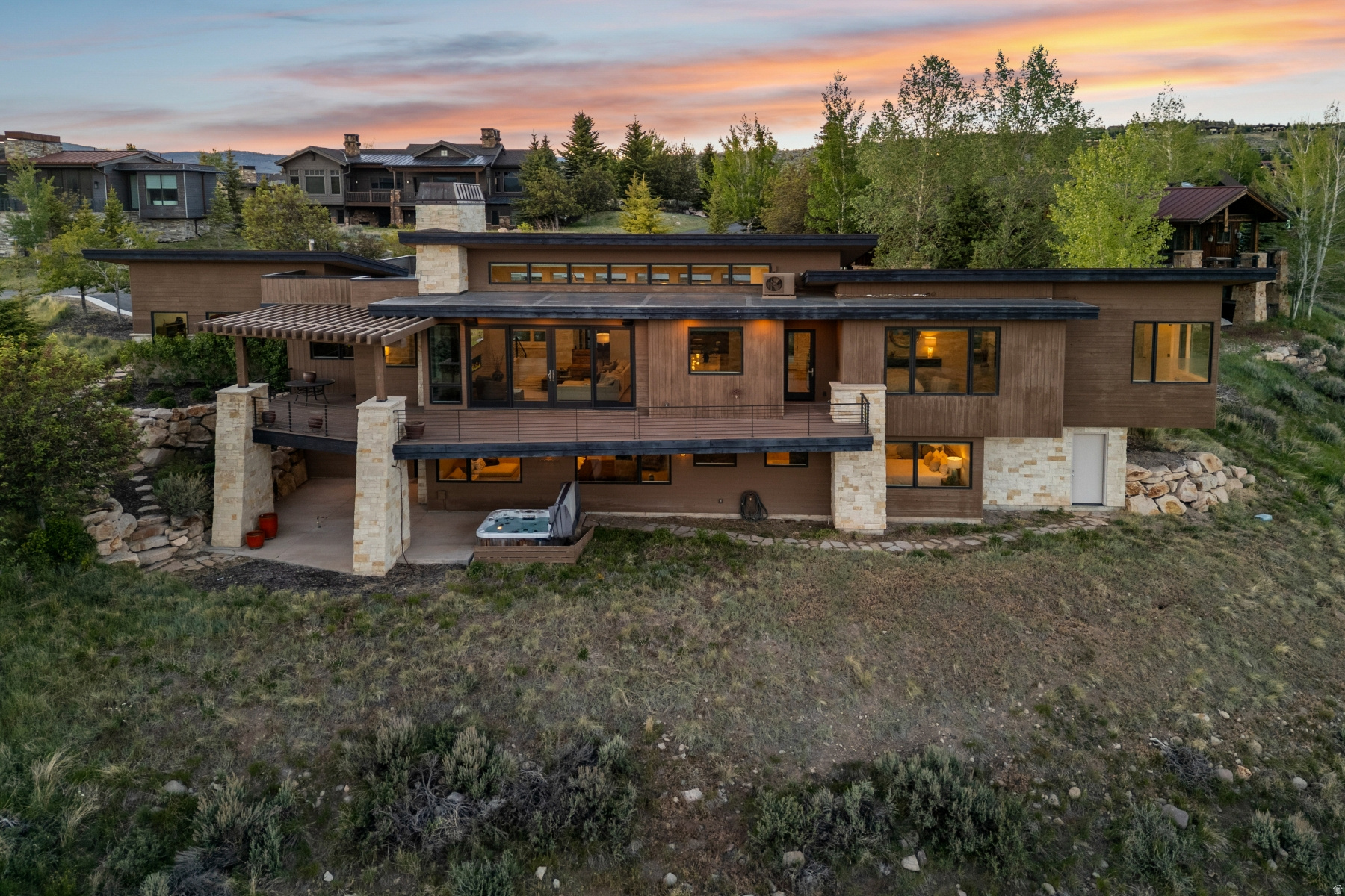 Promontory's Best Ski Views - This is your chance to experience mountain luxury at its finest in this beautifully designed Michael Upwall home, showcasing some of the most spectacular views in the entire community. Perfectly positioned to capture unobstructed panoramic vistas of Deer Valley's iconic Bald Mountain and the ski runs of Park City Mountain Resort; this home offers a front-row seat to Utah's most breathtaking alpine scenery. Thoughtfully designed for effortless main-level living, the home features a spacious primary suite on the main floor alongside the kitchen, great room, and three car garage. Two additional oversized en suite bedrooms provide exceptional comfort and privacy for family and guests. Expansive windows frame the stunning mountain backdrop from nearly every room, seamlessly blending indoor and outdoor living while filling the home with natural light. Whether enjoying a sunrise over Deer Valley, entertaining in the great room, or unwinding after a day on the slopes, this exceptional Promontory retreat offers a rare combination of luxury, convenience, and unforgettable views.
