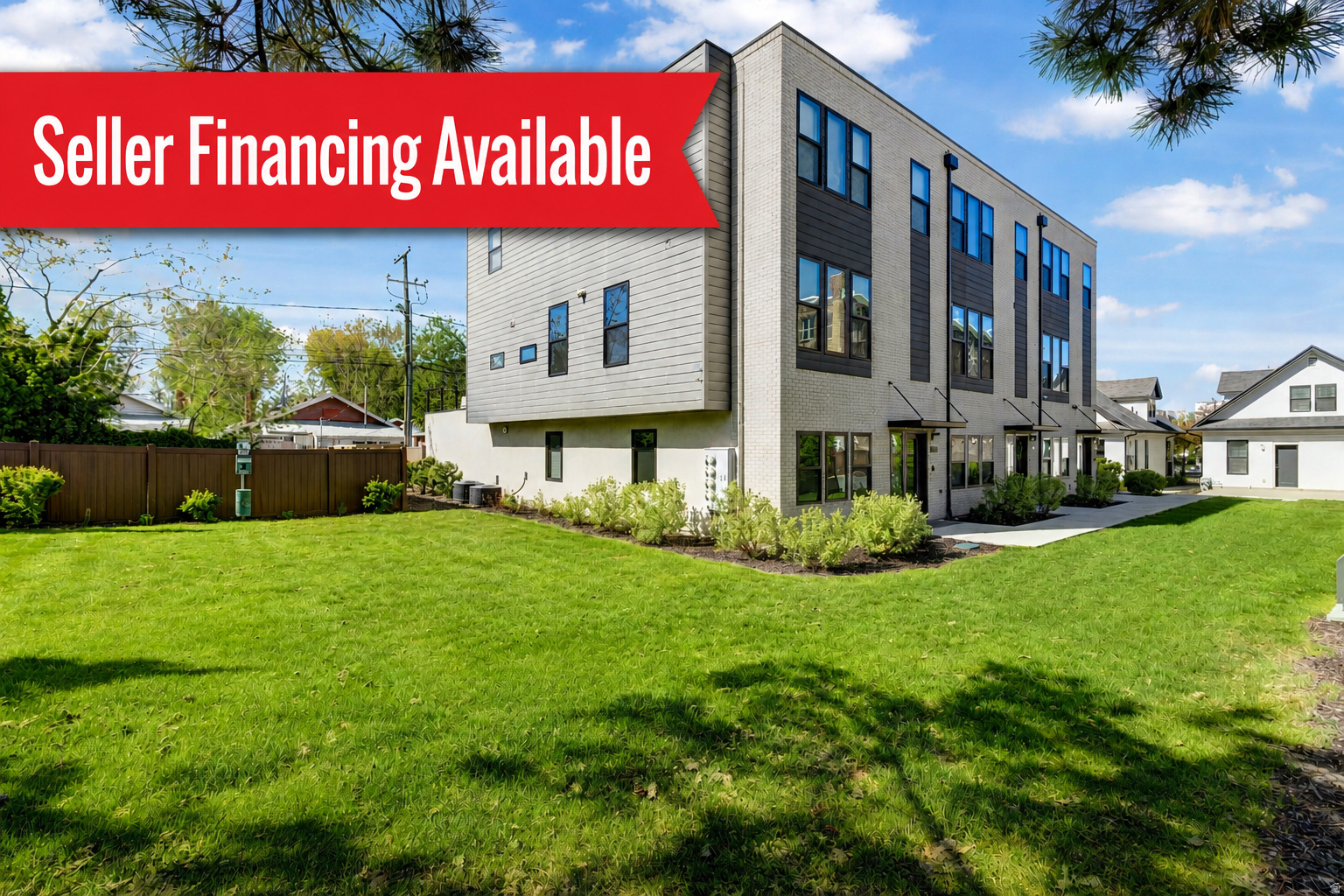 SELLER FINANCING AVAILBLE. A must see, one of a kind, luxury condo in the heart of downtown, walking distance to everything. This like brand new, open concept layout is flooded with natural light from large windows showcasing Wasatch Mountain views; complemented by 9-foot ceilings. Elegant designer finishes include brand new carpet and hardwood flooring, dramatic waterfall island bar, custom cabinetry, floating shelves, and sleek, modern tiles. Rare for downtown living, this home boasts an impressive 400 SF private rooftop patio seamlessly connected from the kitchen through an expansive 3-panel sliding glass door, creating the ultimate indoor-outdoor living experience. The primary suite boasts an extra-large walk in closet and grand bath. The home has two additional bedrooms and two full baths, perfect for hosting friends and family to share the downtown experience. A second great room adds flexibility for entertaining. Additional highlights include a two-car garage, smart connectivity with hardwired Cat5 and Google Fiber available. This home is pre-wired for EV charging. Fantastic schools! Enjoy a fully fenced massive shared green space, large enough for lounging and yard games. When stepping outside to explore the best of SLC you are very close to Trolley Square, Whole Foods, Trader Joes, the library, and just a quick walk to Liberty Park and Tracy Aviary. Enjoy weekend mornings at Park Caf, followed by a short stroll to 9 th and 9 th for exclusive shopping and dining. Another close-by local weekend favorite is a stroll through the Downtown Farmer's Market. It's just a short drive to City Creek for outstanding shopping and no need to worry about parking downtown for the next Jazz or Mammoth game at the Delta Center. With Trax just moments away, enjoy effortless access to the University of Utah, Red Bute Gardens, Utah Natural History Museum and downtown business hubs. World class winter and summer mountain recreation is close by with easy access to Parley's Canyon, Emigration Canyon, Big and Little Cottonwood Canyons. This unique location gives year-round access to all Salt Lake Valley has to offer, making this the perfect urban-center oasis.