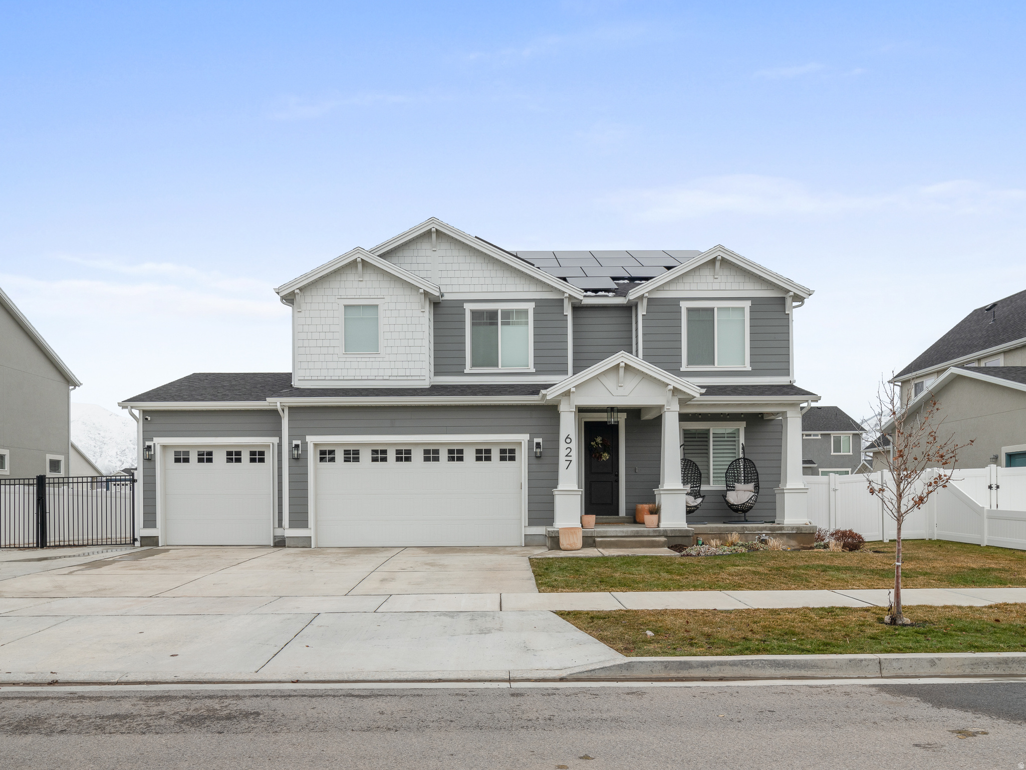 Located in the heart of Mapleton, this stunning fully finished home offers the perfect blend of modern design, functionality, and energy efficiency. Built in 2020, this spacious 7-bedroom, 4-bath residence features over 4,300 square feet of thoughtfully designed living space with high-end finishes throughout and Tesla Charging station in the the garage.   The open-concept floor plan is ideal for entertaining, showcasing a beautifully appointed kitchen with granite countertops, stainless steel appliances, abundant cabinetry, and generous gathering spaces filled with natural light. The luxurious primary suite offers a spa-like ensuite bath with a soaking tub, separate shower, and walk-in closet. Enjoy flexible living options with a fully finished basement, dedicated office/den space, and room for multi-generational living or guests. Outside, the fully landscaped and fenced yard features a patio perfect for relaxing or hosting summer gatherings. Additional highlights include a 3-car garage, RV parking, solar panels with backup battery, energy-efficient systems, and access to the community pool through the HOA. Set in a quiet neighborhood with beautiful mountain views, this home combines comfort, style, and convenience in one exceptional Mapleton property.