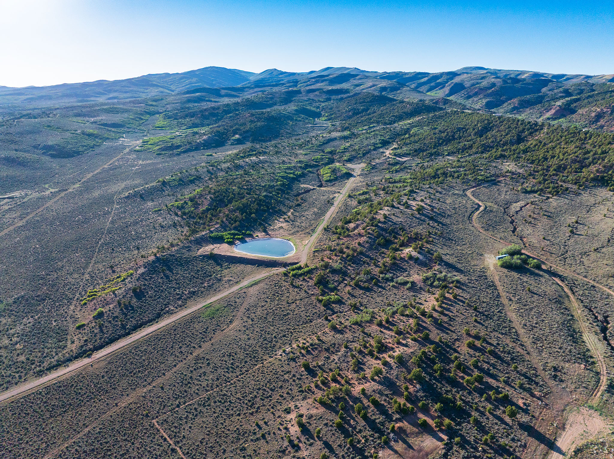 * Stunning 15.18 Acre Lot at Oak Hills Ranch in Fruitland! * Gated Community * Year- round access * Underground Power transformer stubbed to each lot * Connected to water with a shared well & perk test done for septic! * This land is ready to build your dream home or you're welcome to camp! * 6 lots available!! * There is new fishing pond that is being added to the ranch & has many flat areas, trees and landscape * Beautiful views!! * Amazing place to escape and enjoy some peace & quiet * Red Creek Reservoir within minutes * Only 30 mins from world class fishing at Strawberry Reservoir, Starvation & Current Creek Reservoirs along with many streams/rivers! * Fishing, hunting, wildlife and all the recreation you can imagine right from your back door! * Wonderful place to have a vacation getaway or build your dream home! * Horse property! * Miles of dirt roads to ride 4wheelers, dirt bikes & side by sides! * Buyer will be required to pay $275 per year for road maintenance access through Bandanna Ranch/Thunder Ridge. * Once you build - Nightly rentals for AirBnB are allowed!