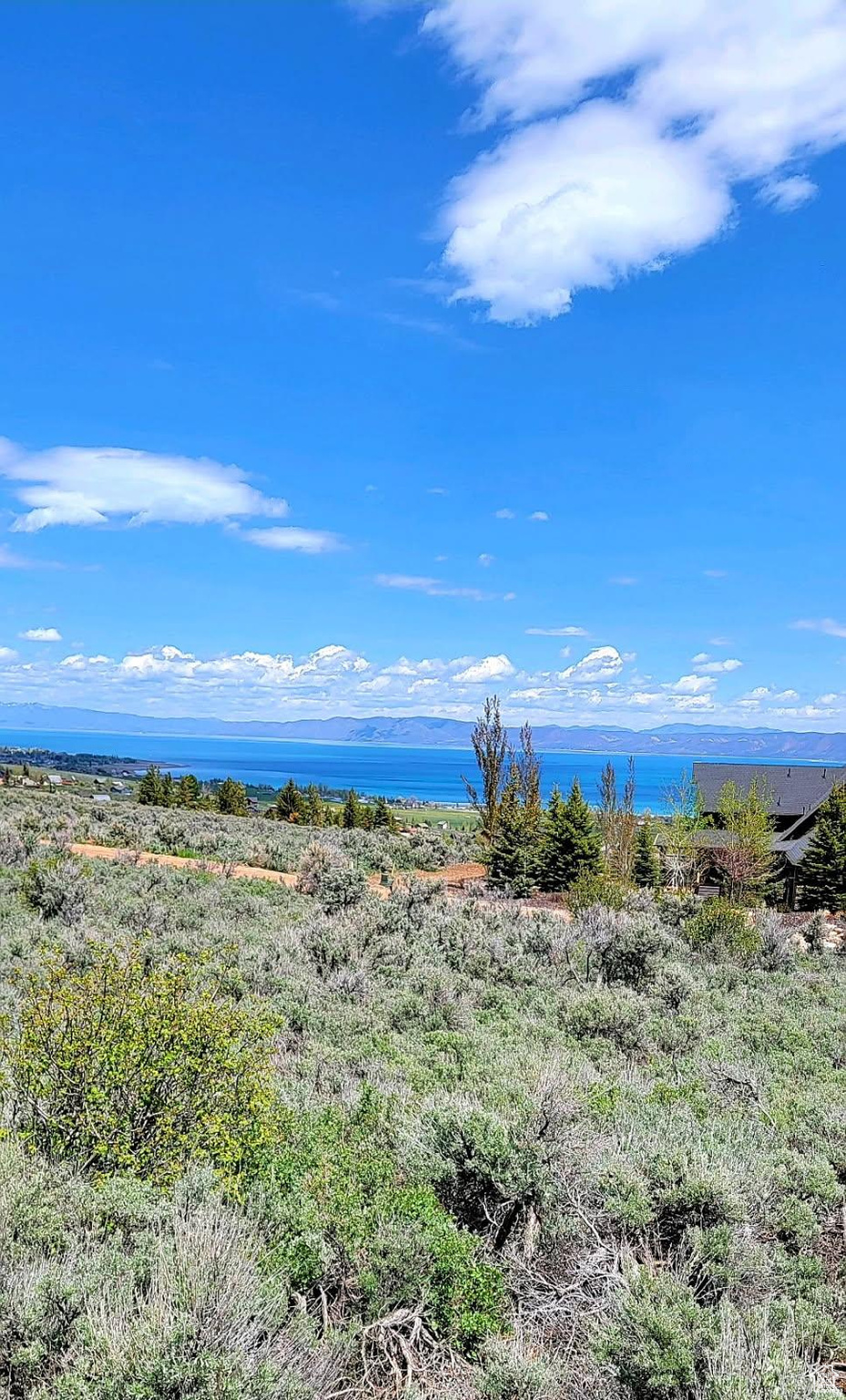 Sweet lot for a great homesite. Amazing views of lake, valley, and mountians. Close to open snowmobileing and ATV fun. A great location for many years of fun!