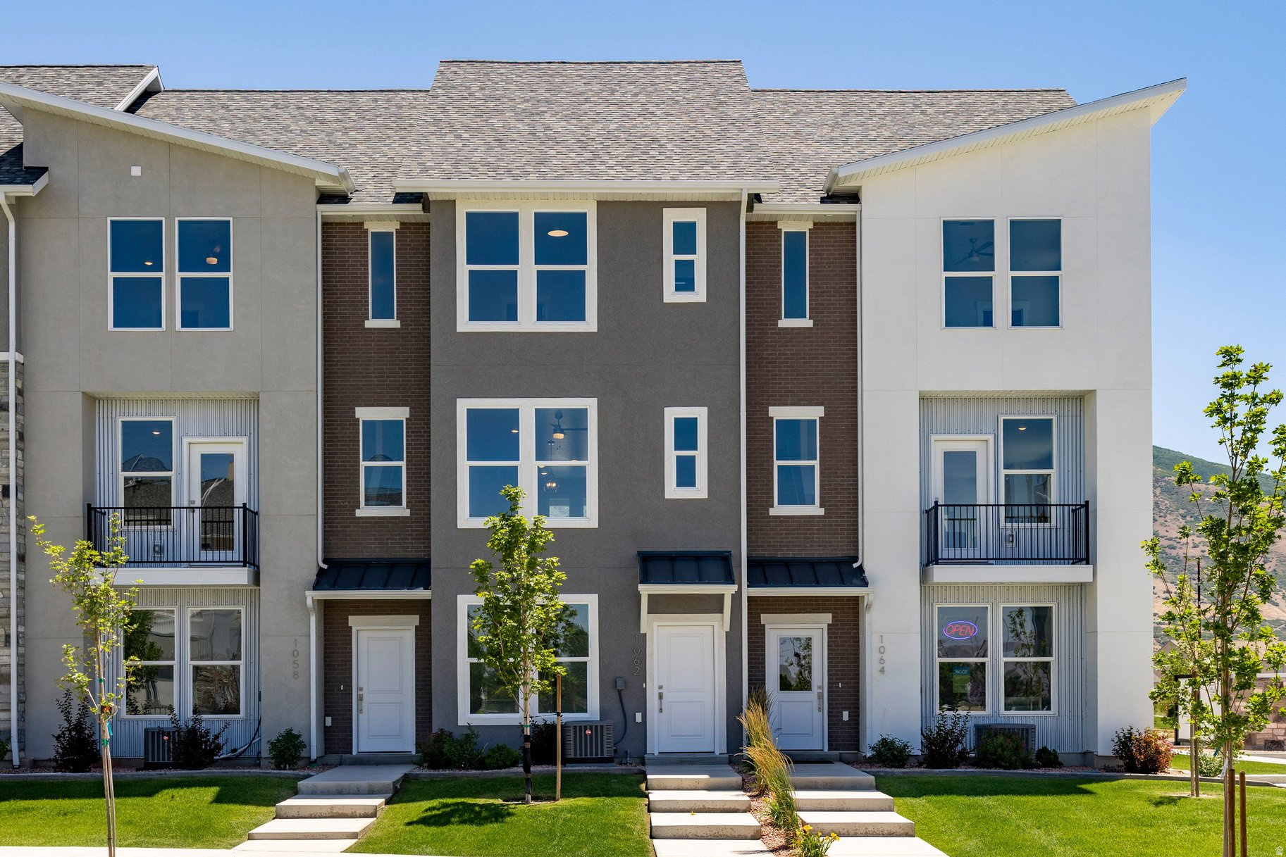 Beautiful three-bedroom townhome at the Ridge at Spanish Fork. This is a three-bedroom Midtown plan that features two ensuite bedrooms, a nice family room, and a large kitchen with a back covered deck. It has a one car attached garage. The Ridge at Spanish Fork is a beautiful townhome community located on the east end of Spanish Fork. The Ridge has a clubhouse with a fitness center, an indoor/outdoor pool, new pickleball courts, and a dog park. The development is conveniently located near shopping (there is a grocery store across the street and Costco is just down the road), restaurants, schools, and only minutes from I-15 and the mouth of Spanish Fork Canyon. The Ridge offers two, three, and four-bedroom floor plans. There is new inventory available and we also work with investors. Come tour the model for more information. Use our preferred lender and receive a $10,000 credit for a rate buydown or closing costs.