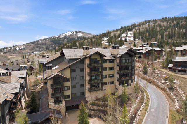 Experience refined mountain living in this updated and well appointed,  3-bedroom, 3-bath Arrowleaf residence, ideally positioned with beautiful views toward Empire Canyon. Offering seamless ski-in/ski-out access, private ski storage, and a well-appointed locker room, this home is designed for effortless alpine living.  Full Talisker Club Membership is available and  elevates the experience with exclusive access to the Tower Club just steps away. Full Talisker Club membership includes world class amenities including  golf, cross country skiing, hiking, biking, tennis, pickleball, spas, water sports and more.     Residents enjoy year-round onsite amenities including an outdoor hot tub, secure underground parking, and on-site security. Nightly rentals permitted, presenting an exceptional opportunity for both personal enjoyment and strong rental income.
