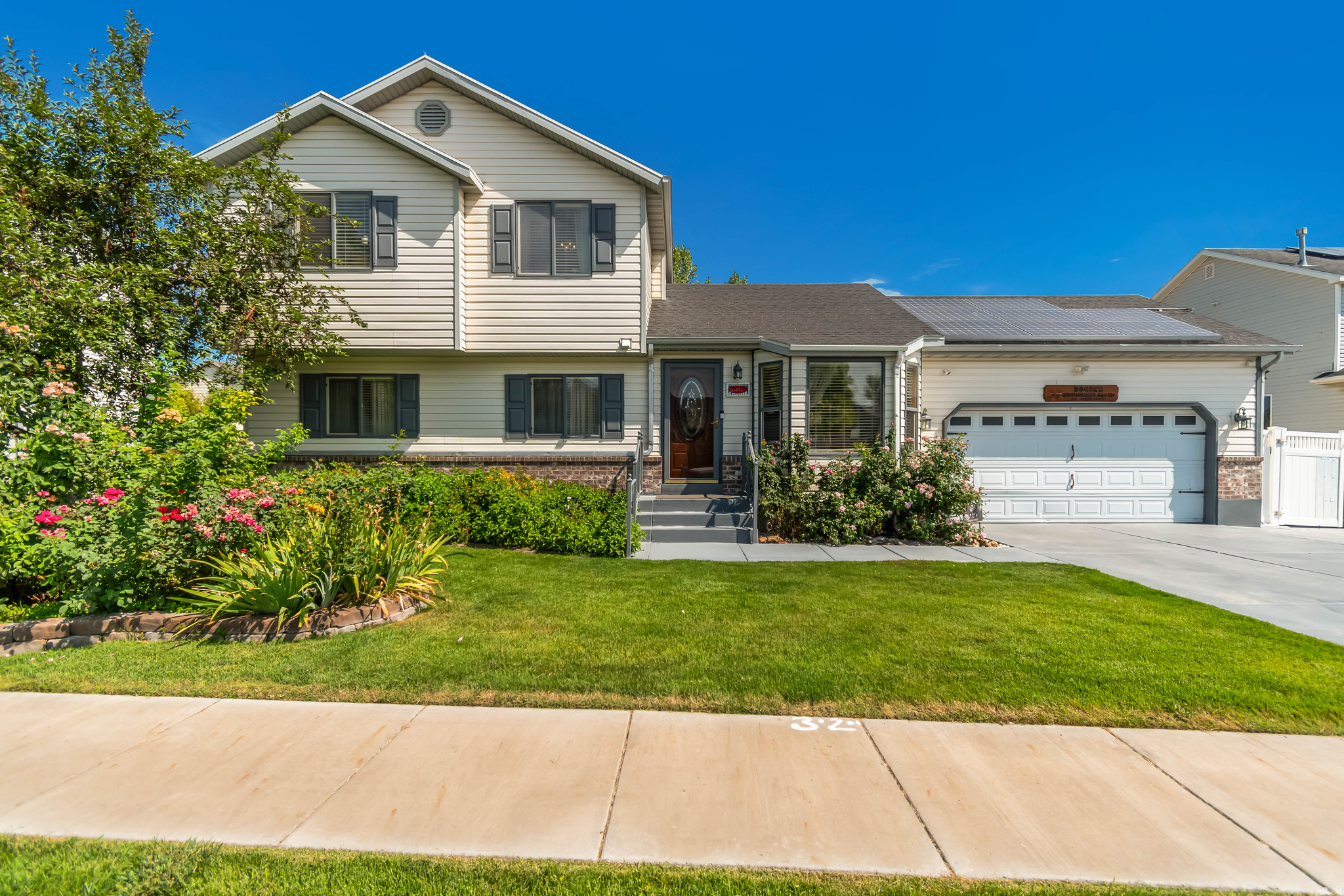 Discover this beautiful 2-story home in Stansbury, UT, designed for effortless living and entertaining. Right by Stansbury Park Golf Course and the swimming pool! Enjoy remarkably low monthly electric bills thanks to equipped solar panels. Last months electric bill was only $7! Tons of storage in the garage, cold storage and the shed! Outside, you will find 2 large covered patios, dedicated RV parking, and expansive garden beds. Perfect for outdoor hobbies and storing your vehicles. Whether you're hosting gatherings on the covered patios or relaxing indoors, this property maximizes both comfort and sustainability. The thoughtful layout and generous outdoor amenities make it an ideal place to call home. Buyer to verify all information in listing.