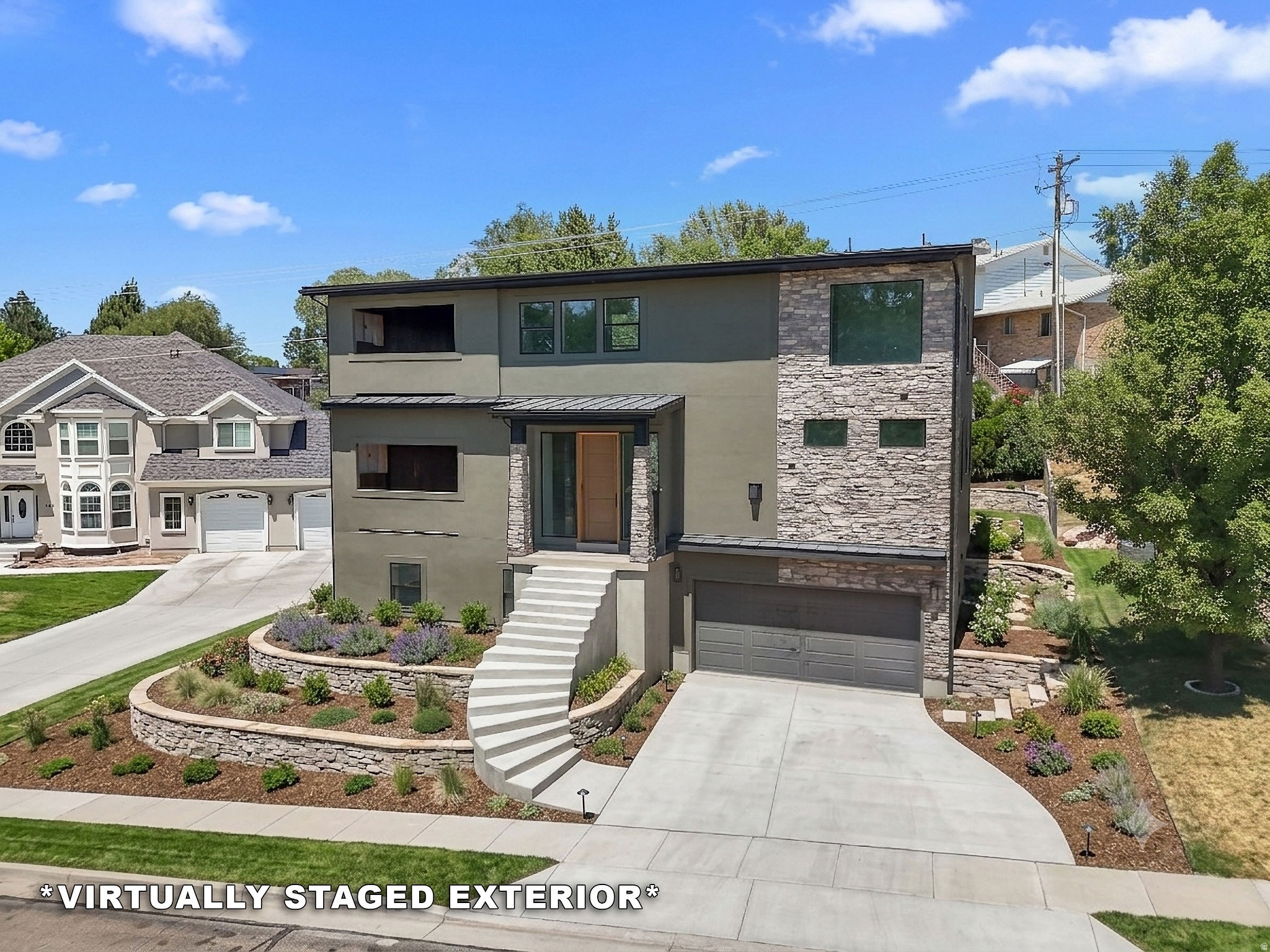 Modern luxury is taking shape in South Ogden! This under-construction custom 2-story home offers a bright, open design with elevated ceilings on every level and incredible indoor/outdoor living.  The main level features 10' ceilings, a stunning great room with fireplace, and a modern layout filled with natural light. Upstairs, the oversized MASTER SUITE is A TRUE RETREAT with dramatic 8' - 15' ceiling, its own fireplace, and access to elevated outdoor living. Two patios with fireplaces create cozy spaces to unwind, entertain, and enjoy the mountain lifestyle.  The basement offers 9' ceilings and a built-in ADU with a separate heating and cooling system, adding flexibility for guests, extended family, or investment potential.  Located in South Ogden with easy access to the great outdoors, this home is less than 30 minutes from Snowbasin Ski Resort and Wasatch Peaks Ranch (skiing & golfing). Within 3 minutes of the Ogden Golf & Country Club!    Modern comfort, lifestyle, and ADU attached.   Square footage figures are provided as a courtesy estimate only and were obtained from builder plans.    Buyer is advised to obtain an independent measurement.