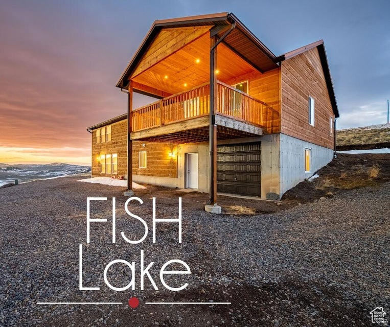 Your own slice of mountain paradise just a couple miles from Fish Lake, one of central Utah's beloved high-country destinations. Nestled just outside the basin within Fish Lake National Forest, this property offers year-round access to boating, fishing, hunting, hiking, snowmobiling, ice fishing, snowshoeing, and extensive ATV trails-making it the perfect four-season retreat.  Currently operating as a successful short-term rental, this property presents an excellent investment opportunity with income potential. Contact the listing agent for detailed financial information and see how this mountain getaway can help pay for itself.  Crafted from Texas White Pine Cedar and thoughtfully designed to accommodate large groups, the home offers generous parking for vehicles and recreational toys, along with expansive indoor gathering spaces. Main/entrance level has large family room with beautiful views from all angles as well as 5 bedrooms, 2 baths, a laundry room, and a kitchenette.  Downstairs has an additional bedroom, a bathroom, a large updated kitchen, game room, and lots of storage.  Highway 25 is maintained year-round by Utah Department of Transportation, leaving only the short private driveway to self-manage for full seasonal accessibility.  The property also includes a 300-gallon water trailer for easily filling the 2,500-gallon basement water tank-providing reliable year-round water storage. Furniture is included, allowing for a seamless transition into personal use or continued rental operation.  Whether you're looking for a personal mountain escape, an income-producing property, or both, this stunning retreat offers the best of all seasons in one exceptional location.