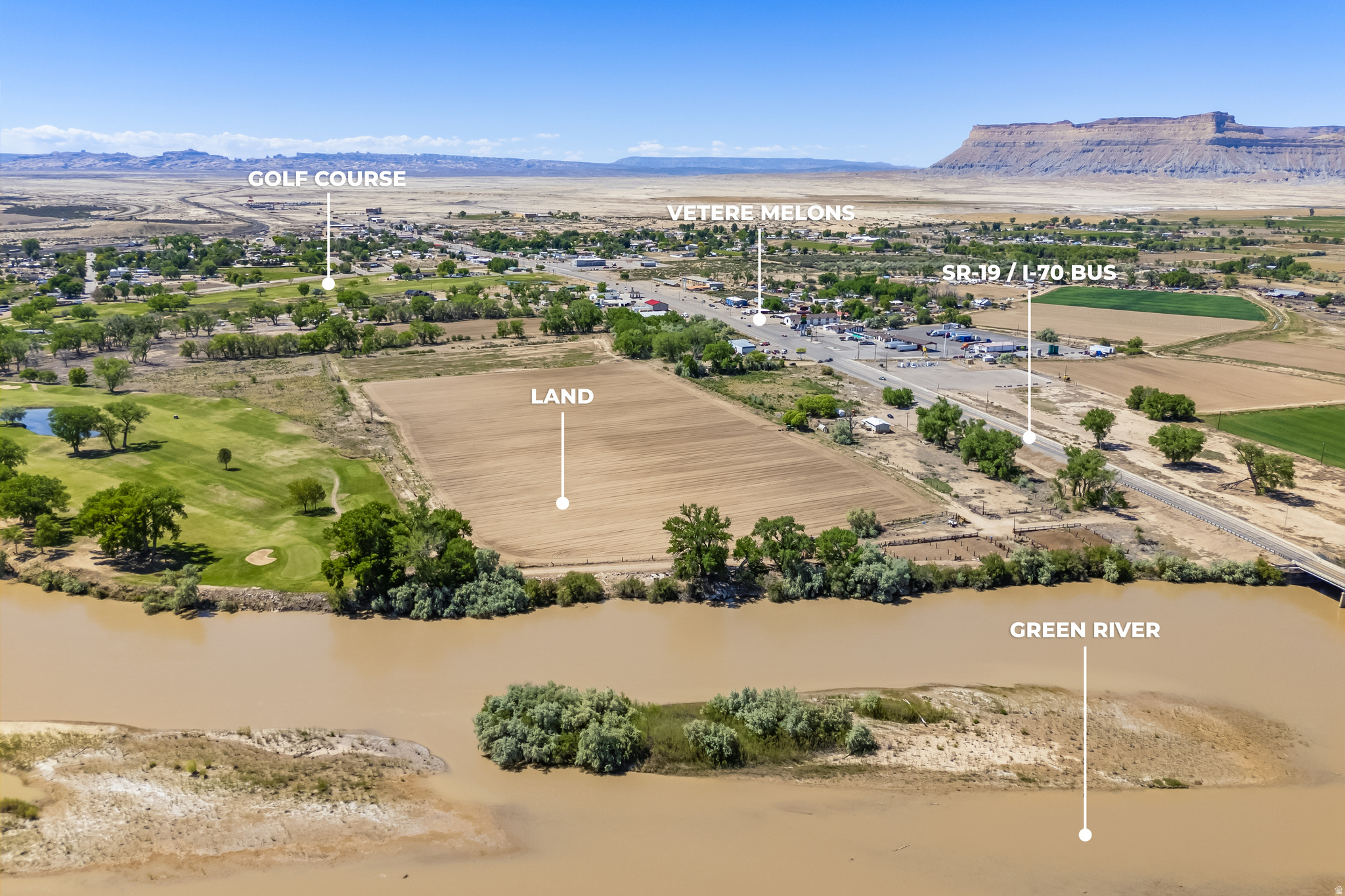 BUILD YOUR DREAM HERE! PRIME MAIN STREET COMMERCIAL PROPERTY BORDERING BOTH THE GREEN RIVER AND THE GREEN RIVER STATE PARK GOLF COURSE. Rare opportunity to acquire 45.51 acres of prime mixed-use development land located directly on Main Street in the heart of Green River, featuring over 1,170 feet of Main Street frontage. Zoned C-1 and R-1, this property offers exceptional flexibility for a wide variety of commercial and residential uses, including a hotel or motel, mixed-use development, residential subdivision, retail center, restaurants, senior housing, self-storage, a potential RV resort (conditional use approval required), and more. Ideally situated adjacent to the Green River State Park Golf Course and the Green River, this property is perfectly positioned to capitalize on the area's growing tourism and development potential. The property includes valuable water rights and a total of 80 water shares. Utilities are available to support future development, and an existing 4-bedroom, 2-bath grandfathered residence provides immediate rental income, onsite management housing, or a future office or model home. Currently in Greenbelt tax status. Green River is the gateway to some of Utah's most incredible outdoor recreation, including rafting, fishing, hiking, golfing, and easy access to nearby national parks. Invest in Green River's future with one of the most versatile development opportunities on Main Street in Utah.