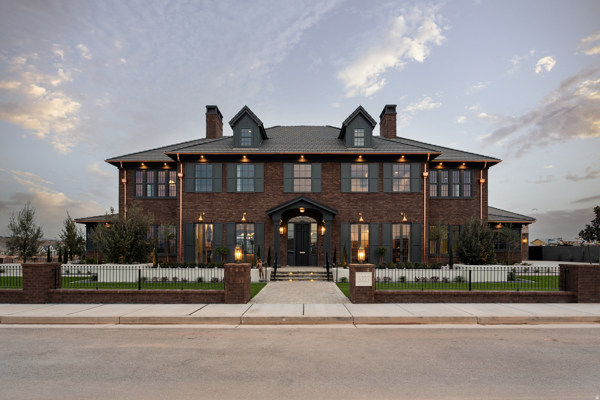 Welcome to McAllister Manor, where legendary inspiration meets extraordinary luxury.Designed as a playful tribute to the classic film Home Alone, this breathtaking 13,915 sq. ft. estate by Strata Homes is a show-stopping centerpiece of the 2026 Parade of Homes. With a front faade that mirrors the iconic movie residence, this home delivers nostalgic charm wrapped in uncompromising modern elegance. McAllister Manor features 6 bedrooms, 8.5 bathrooms, and a floorplan crafted for both grand entertaining and everyday comfort. The main level is anchored by a luxurious primary suite and includes a private office, art room, and an attached casita perfect for guests or multigenerational living.  Expansive living areas flow seamlessly to the backyard oasis, complete with a resort-style pool and a fully equipped outdoor kitchen.  The second floor is built for lifestyle and leisure, offering a state-of-the-art home theater, fully appointed gym, and beautifully designed secondary bedrooms and gathering spaces. And then there's the top floor, reserved entirely for fun and imagination: a whimsical private attic retreat known as "Kevin's Room," an unforgettable nod to the home's cinematic roots.  For the ultimate in recreation, the property boasts a full sports court with its own lounge area, creating a year-round hub for games, fitness, and entertaining. Car enthusiasts will appreciate the impressive 8-car garage, providing abundant space for vehicles, toys, and storage.  Every corner of McAllister Manor reflects meticulous craftsmanship, high-end finishes, and thoughtful design. Equal parts sophisticated and playful, this is more than a luxury home. It's a destination, a conversation piece, and a once-in-a-lifetime opportunity. *Furniture is available for purchase
