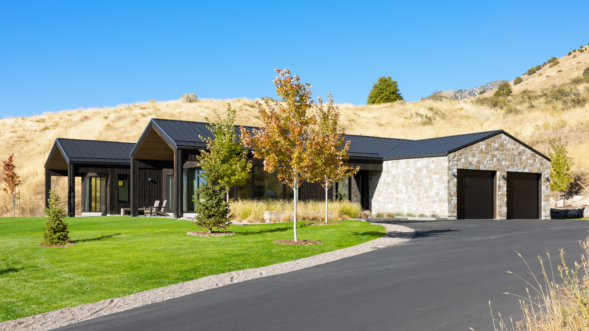 Welcome to 1647 Quail Canyon Drive, a stunning mountain residence in the heart of Logan, Utah.  Nestled in a serene, private setting, this home offers breathtaking views of Cache Valley and its majestic mountain peaks.  Perfectly blending luxury and nature, this residence provides a tranquil escape with sophisticated charm. Designed for both everyday comfort and elegant entertaining, the humble home boasts an open main level with seamless access to outdoor living spaces. Savor morning brunch on the private patios, surrounded by mature landscaping where local wildlife, like deer, roam freely.  The chef-inspired kitchen is fully equipped with luxury appliances, including a wood-paneled refrigerator and freezer, a sleek gas cooktop, a drawer-style dishwasher, and a modern steam oven.  The stunning living room, anchored by a striking natural-gas fireplace, ideal for cozy evenings. The primary suite is a true sanctuary, featuring a luxurious shower, a boutique-style closet, and a private covered patio for peaceful moments. Adjacent to the primary suite, two bright rooms with inspiring views and outdoor access provide the flexibility for bedroom or office space. The floor plan shines on the lower level, offering three guest rooms, a laundry room, a gym, and a living room for ultimate entertainment. Unwind in the detached cedar sauna, a tranquil retreat for relaxation. With this spacious lot, there is plenty of room for future additions to the property such as a pool or a detached garage. Behind the spacious 2-car garage, a separate shop provides ideal space for a wide variety of projects and storage. With Logan's vibrant community just minutes away, enjoy easy access to top-rated schools, shopping, dining, and outdoor recreation, including direct access to hiking and biking trails. Only a short drive from Logan Canyon and Utah State University, this home combines urban convenience with the serenity of mountain living. This exceptional property offers a rare opportunity to embrace a lifestyle of privacy, luxury, and natural beauty in one of Logan's most desirable locations. Square footage figures are provided as a courtesy estimate only and were obtained from building plans. Buyer is advised to obtain an independent measurement. Please contact agent for appointments. Agent is a relative of the Seller.