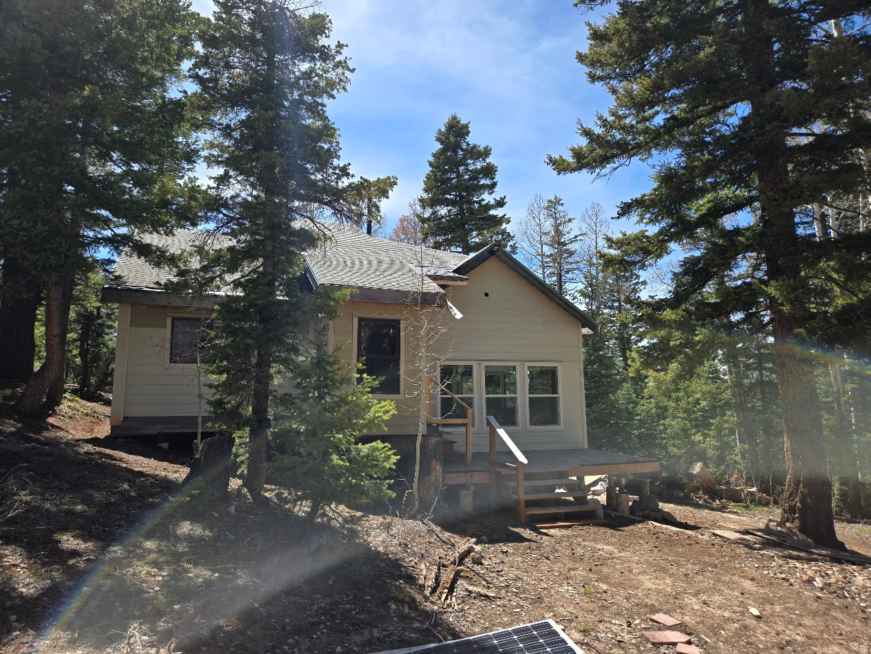 Handyman Special | Off-Grid Mountain Cabin - Navajo Estates, Duck Creek Village, UT Priced to Sell at $154,900! This 1-bedroom (easily convertible to 2) off-grid cabin with large loft and 1 bath sits on 0.51 acres in desirable Navajo Estates. Key Features: New siding, new windows, newer furnace, and 12x32 1-car garage/shed 1,000-gallon water tank + finished plumbing Great working wood stove Fully wired - runs on Solar, Generator & Propane Septic system installed Fresh water spring just 2 miles away Location & Lifestyle: Nestled in the Mountain close to Duck Creek Village, this property is just minutes from beautiful Navajo Lake -- a premier destination for trout fishing, boating, and camping. Enjoy world-class trail riding with direct access to extensive ATV, UTV, horseback, and hiking trails. Surrounded by towering pines and mountain scenery, this is true Southern Utah mountain living. Seasonal access, no public utilities. Perfect for handymen, contractors, or anyone seeking a private mountain getaway or weekend retreat. Preferred Lender: Ryan Bolton - Patriot Mortgage (flexible lending options available) Bring your finishing touches and make this mountain cabin your own! Buyer and Buyer Agent to verify all information