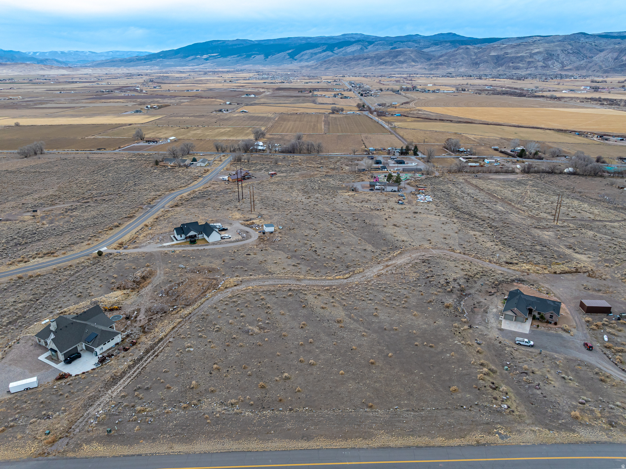 Discover the perfect blend of seclusion and convenience with this stunning 5-acre building lot in the desirable Canyon View Estates subdivision in Monroe. Nestled in the foothills of the Monroe Mountain Range, this elevated property offers breathtaking panoramic views of the Sevier Valley and surrounding mountain ranges. Enjoy paved road access and nearby utilities while still having ample space and privacy to create your ideal retreat. With endless mountain trails, outdoor recreation, and year-round adventure right out your back door, this property is ideal for those seeking peaceful mountain living without sacrificing essential amenities. A rare opportunity to build your dream home in a truly scenic setting. The property is within the Austin Community Special Service District for Culinary Water, but the property still comes with an underground water right, with the possibility to drill a well . Buyers to verify of connection fees, and availability.